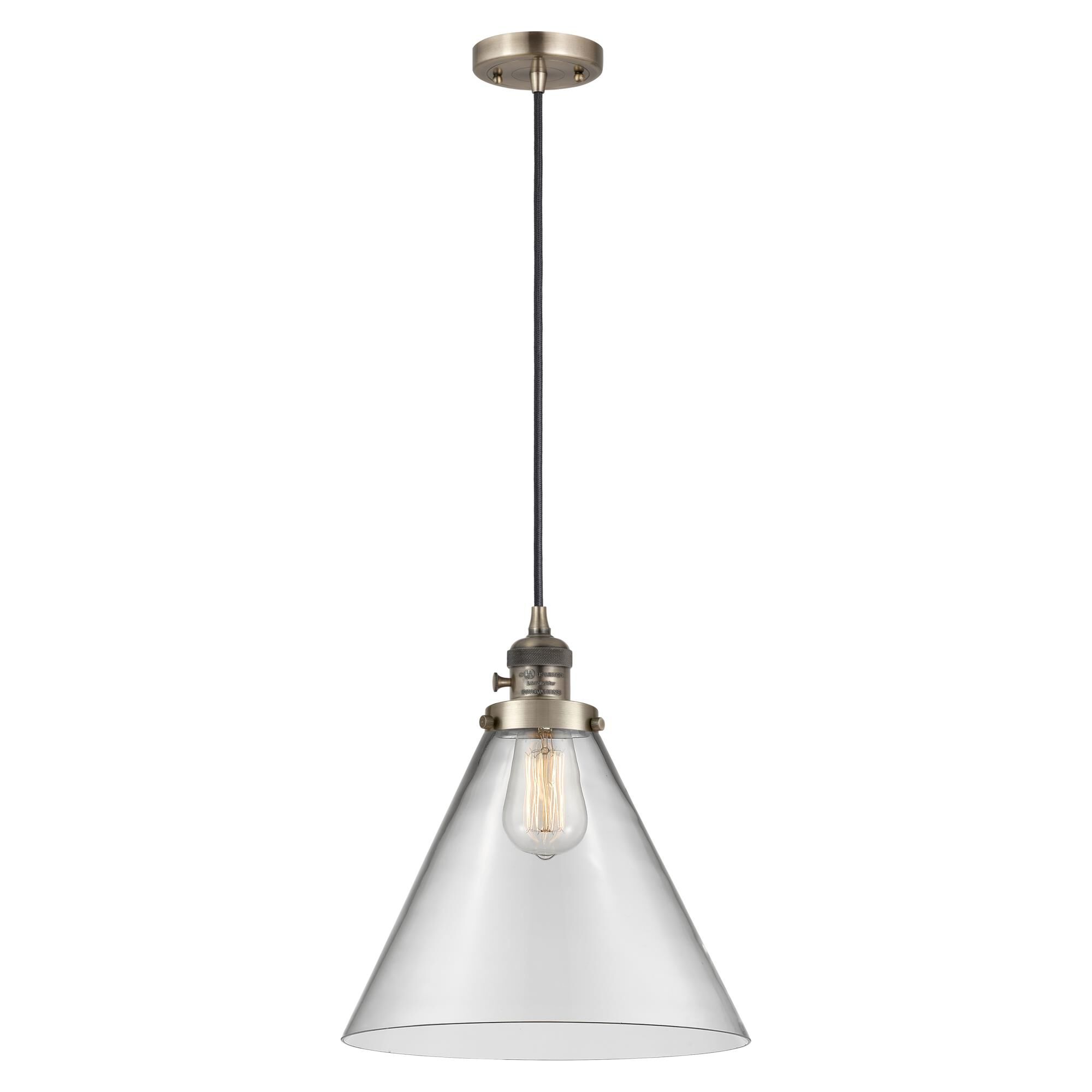 Shown in Antique Brass finish and Clear glass