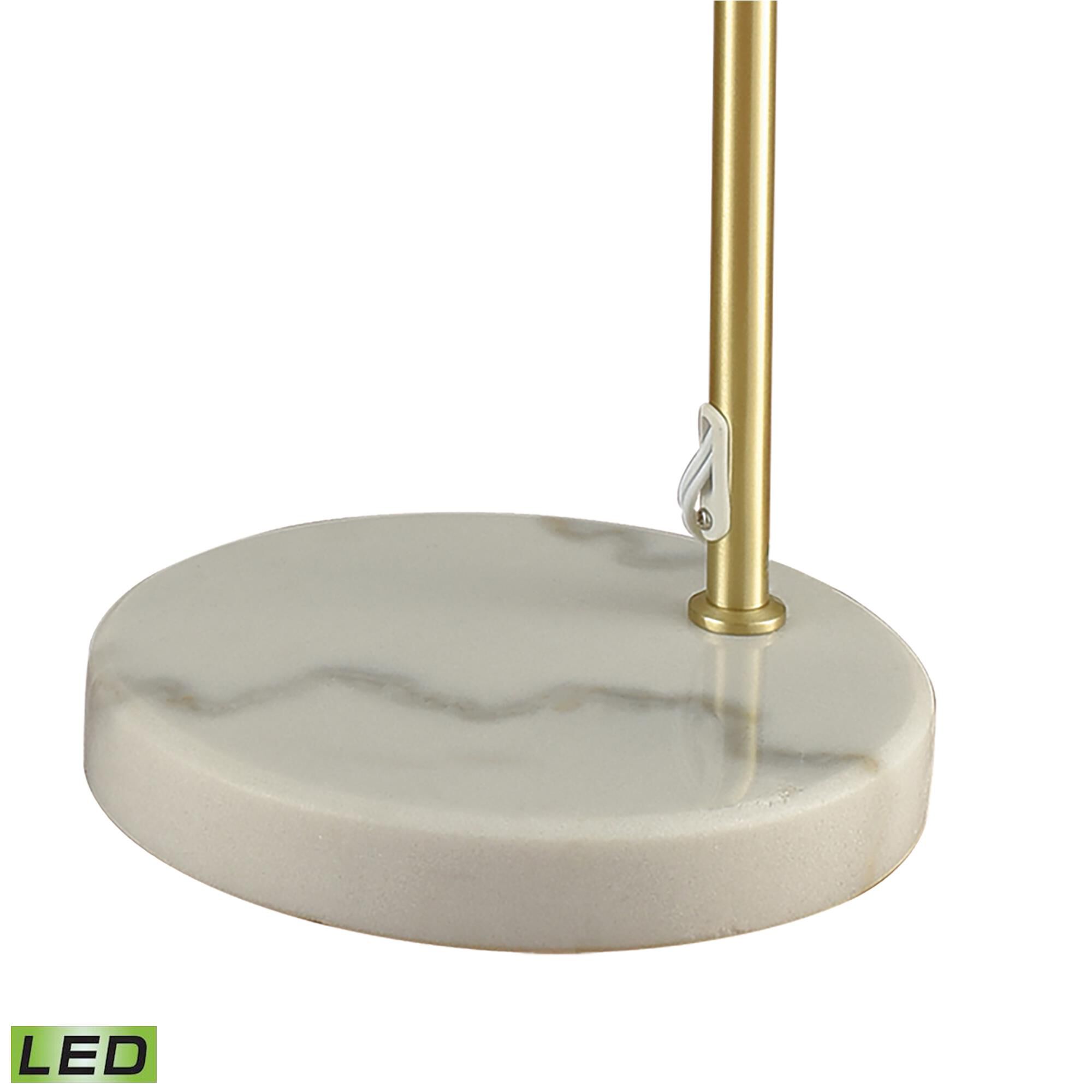 Shown in Aged Brass finish and Metal shade