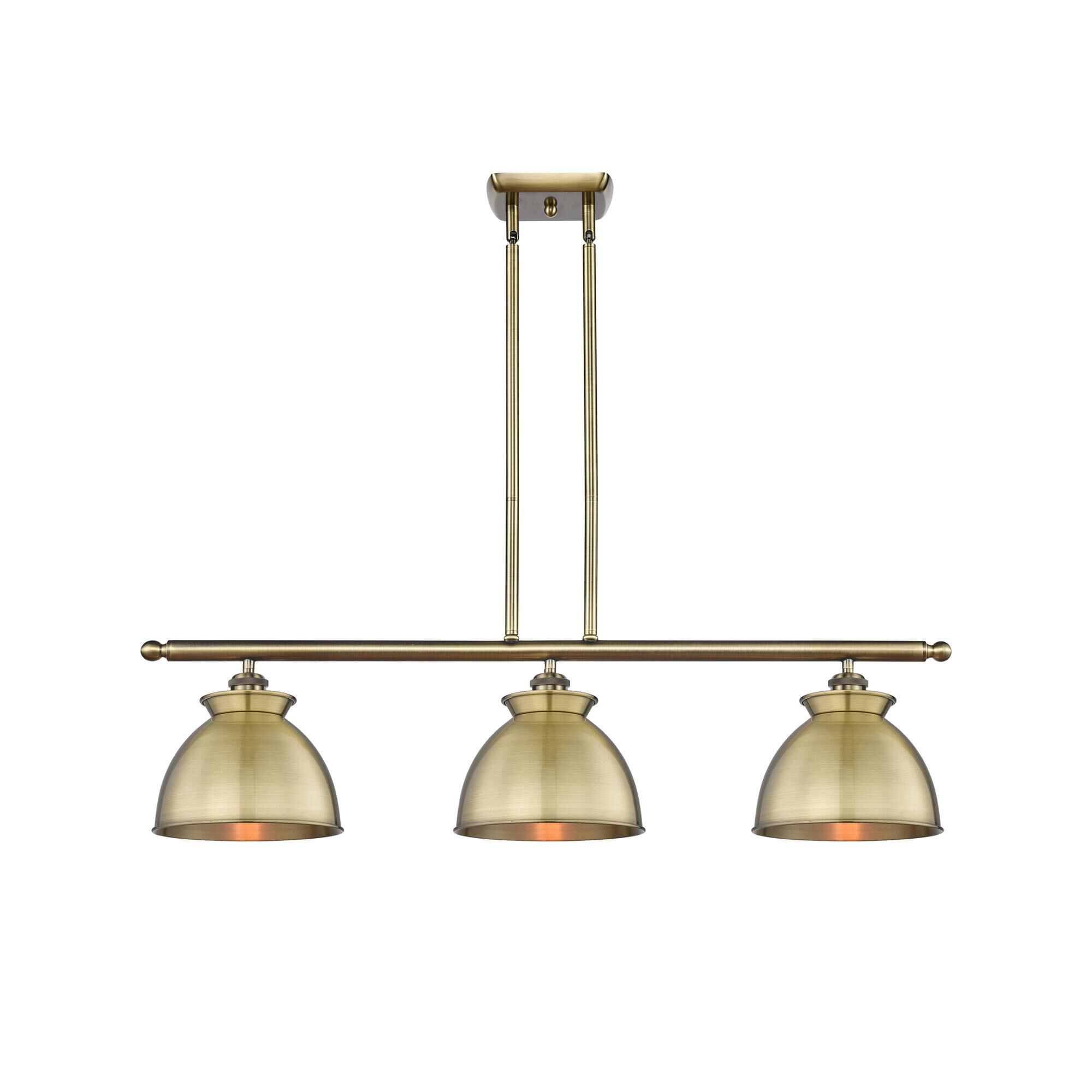 Shown in Antique Brass finish and Antique Brass shade