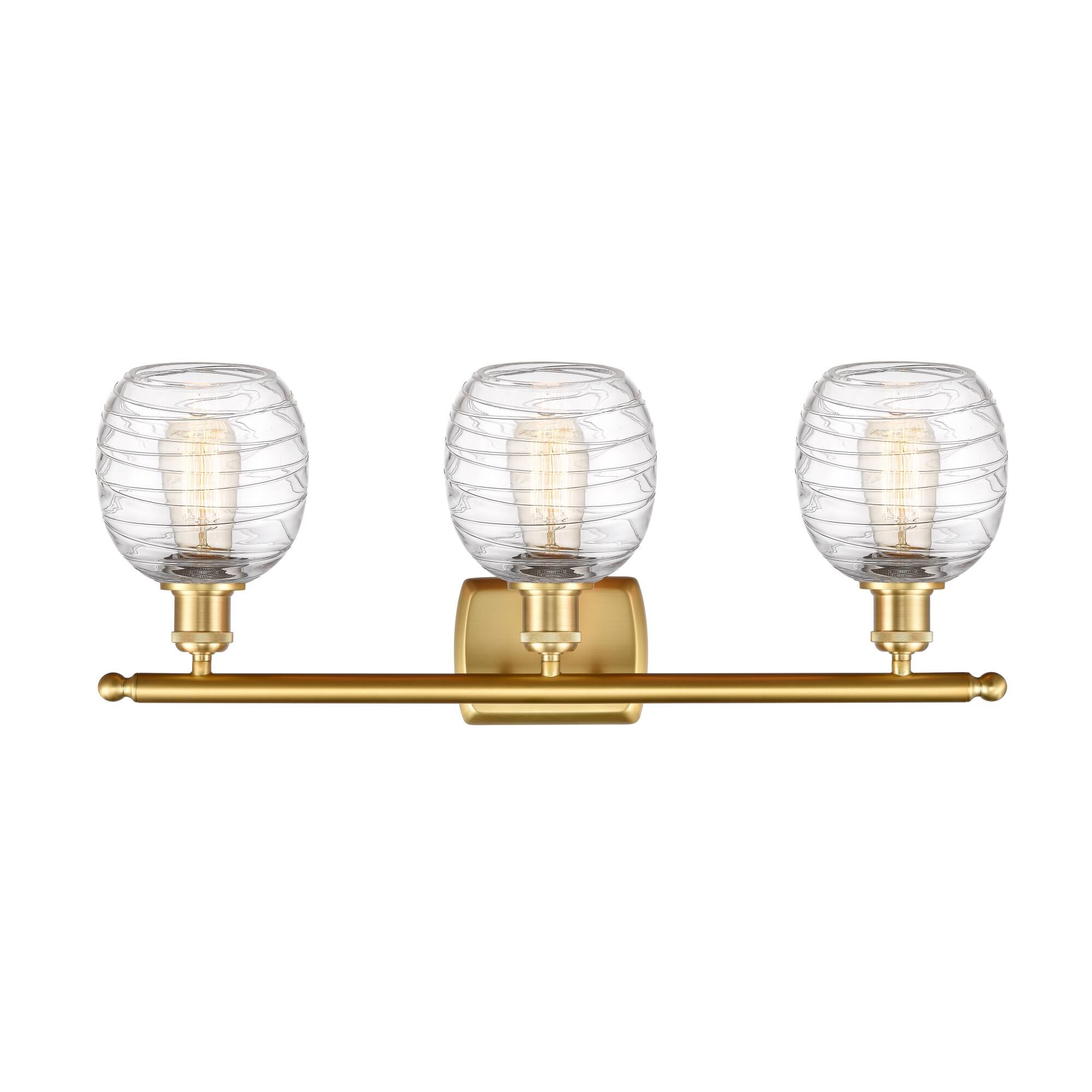 Shown in Satin Gold finish and Deco Swirl glass