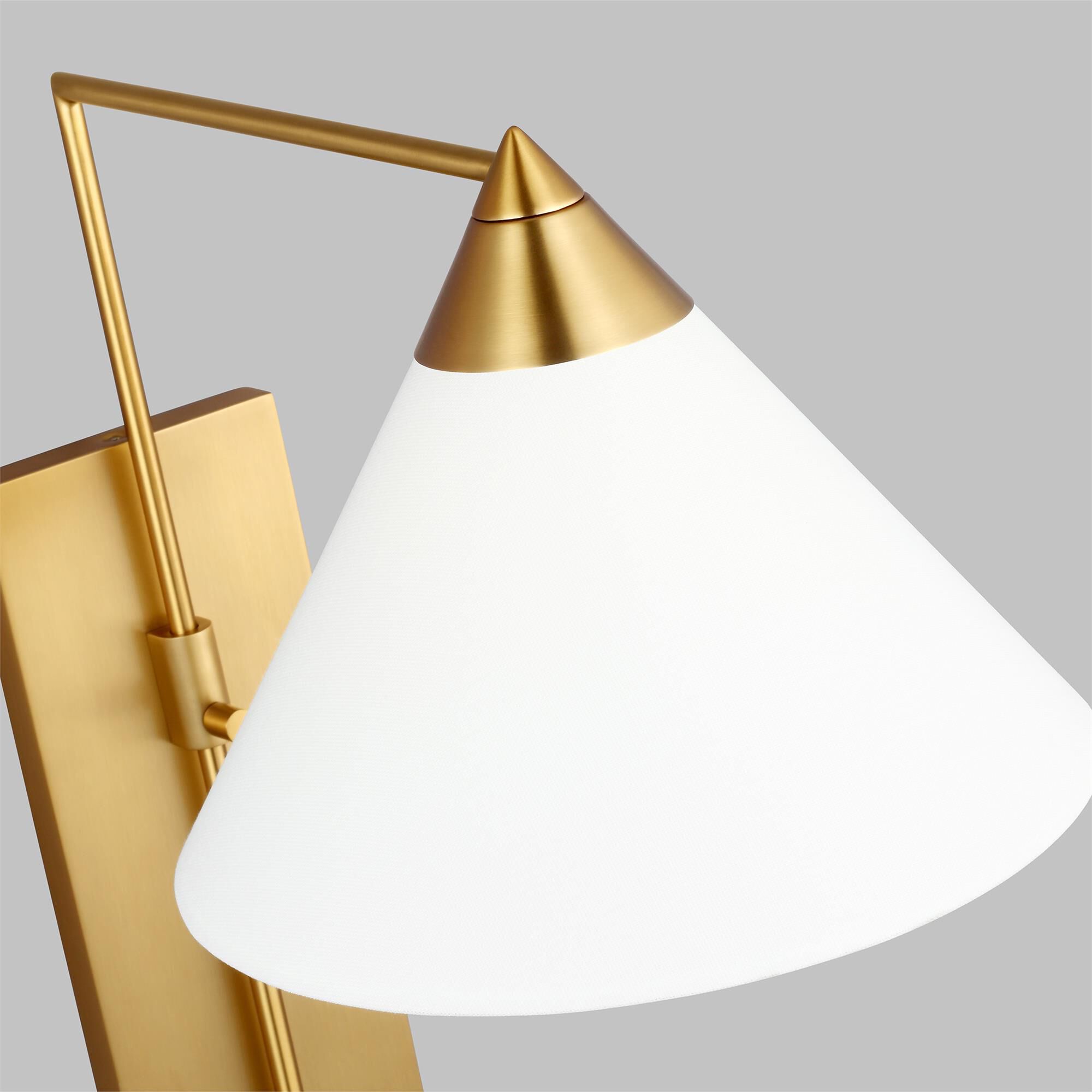 Shown in Burnished Brass finish and White Linen Fabric shade