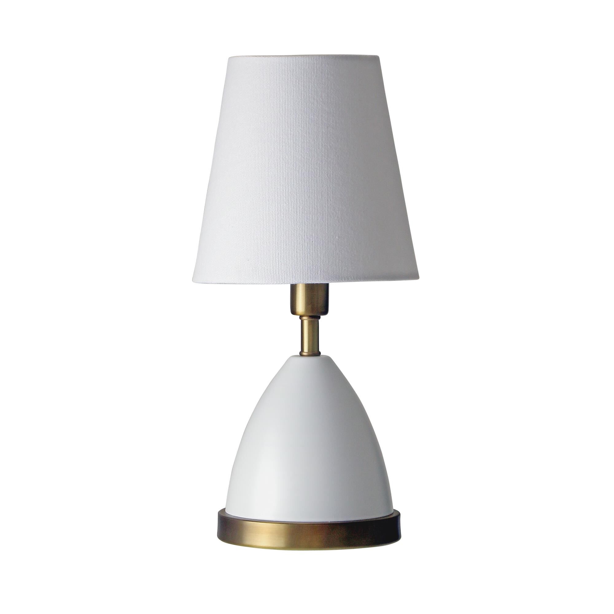 Shown in White With Weathered Brass Accents finish and Linen Hardback shade and Weathered Brass accent