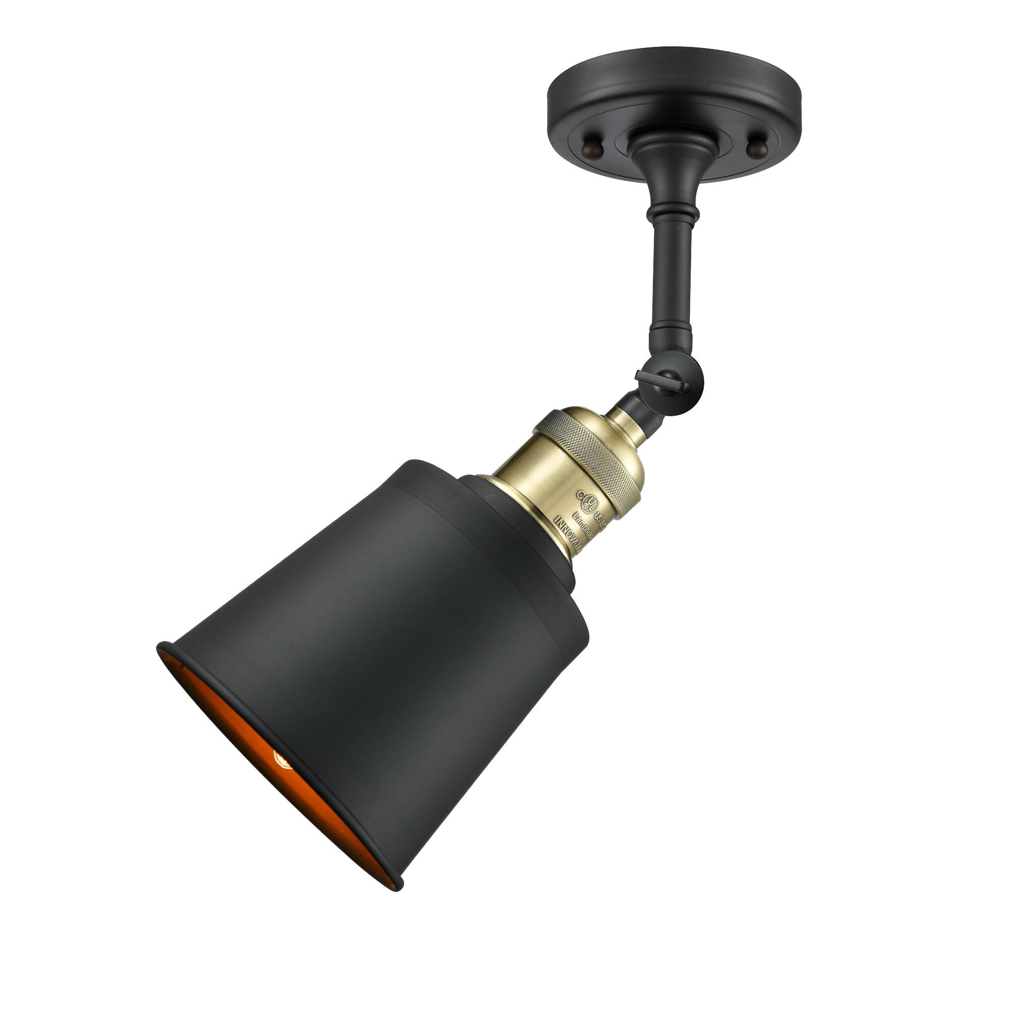 Shown in  Black Antique Brass finish and Metal - Brushed Brass - Cone shade