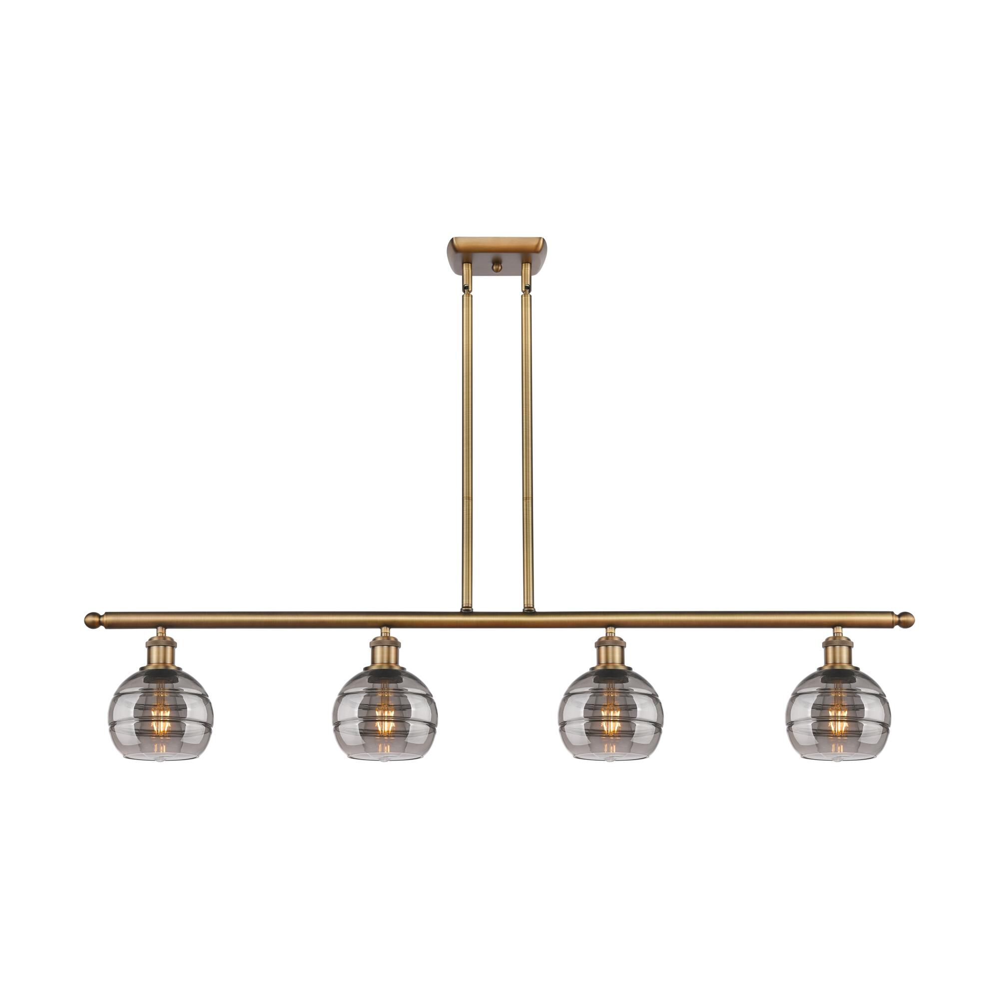 Shown in Brushed Brass finish and Light Smoke glass