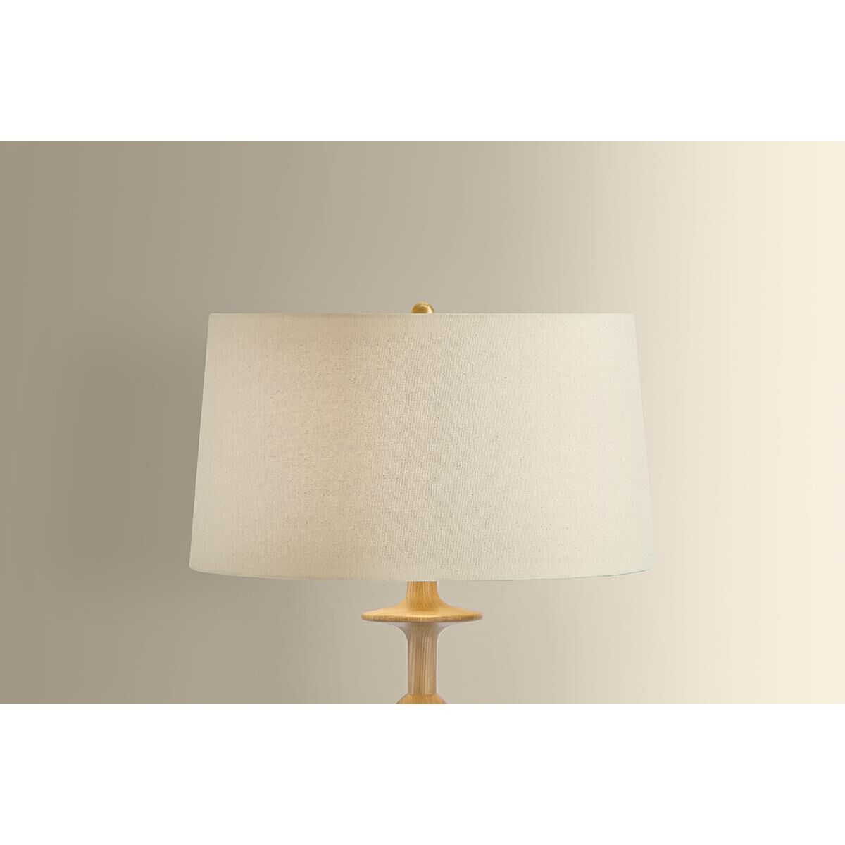 Shown in Aged Brass finish and Wheat Linen shade
