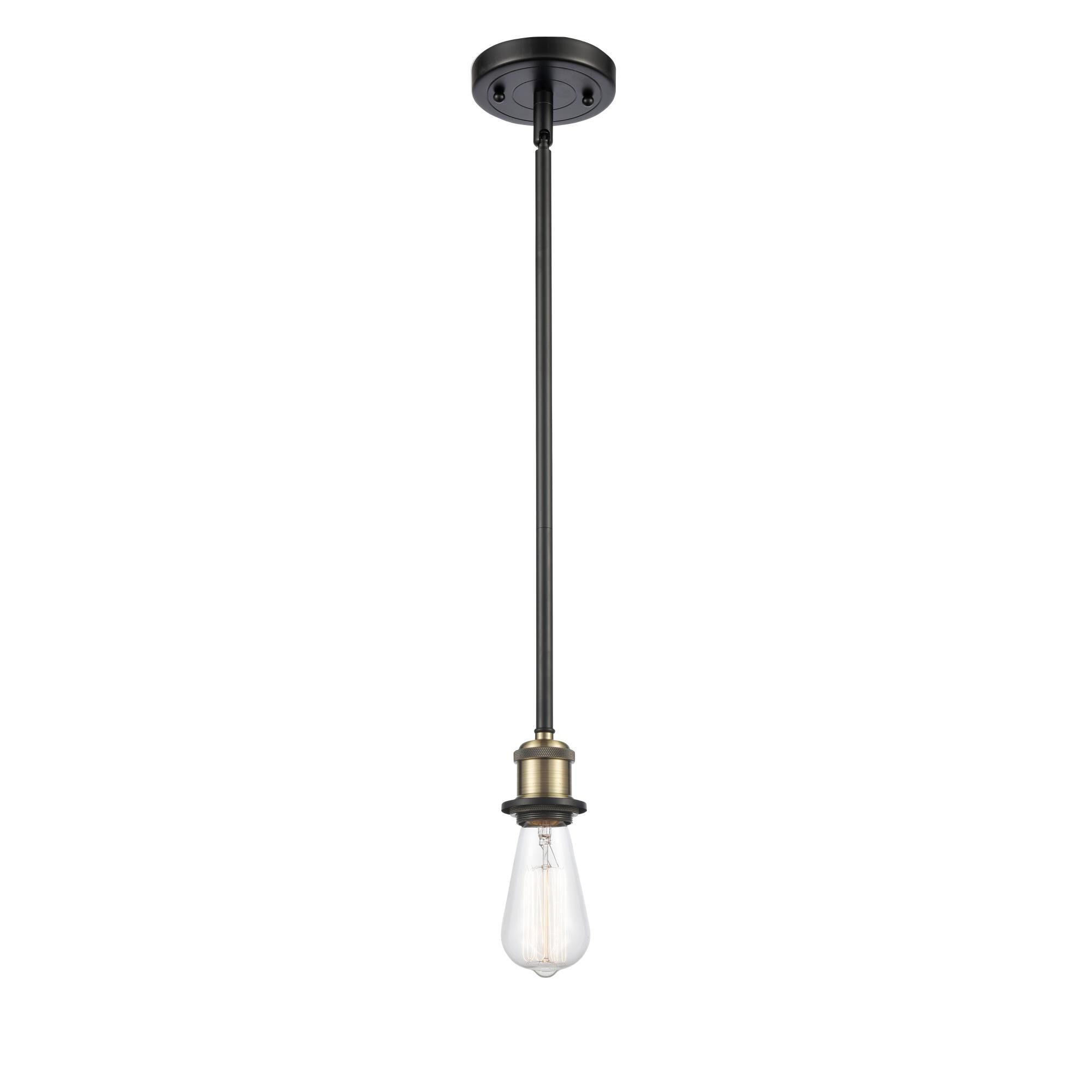 Shown in Black Antique Brass finish and Polished Chrome shade