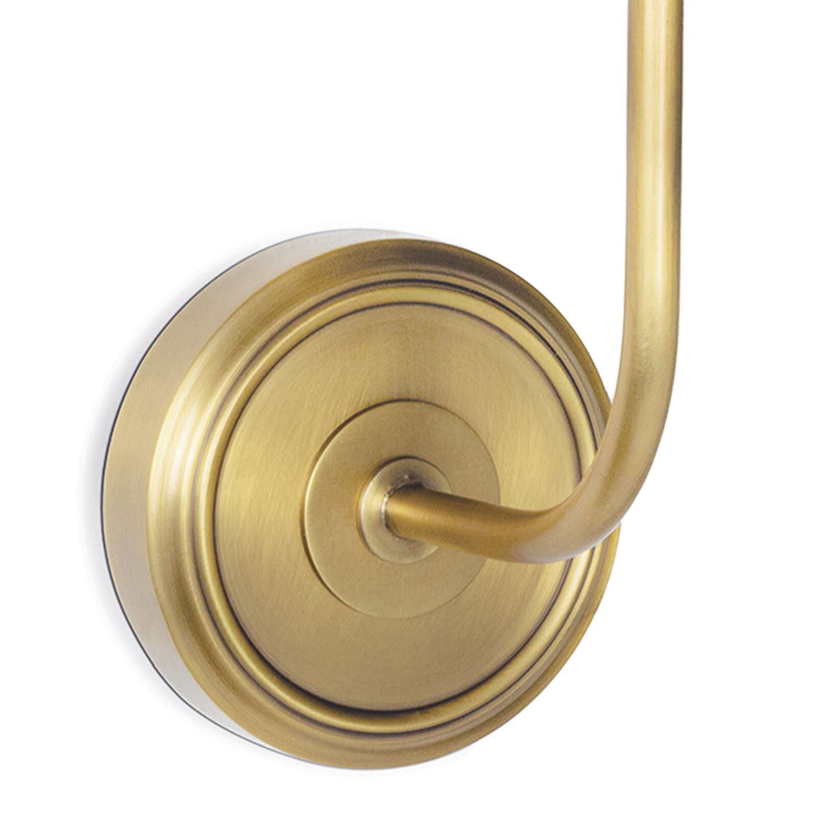 Shown in Natural Brass finish and Linen shade