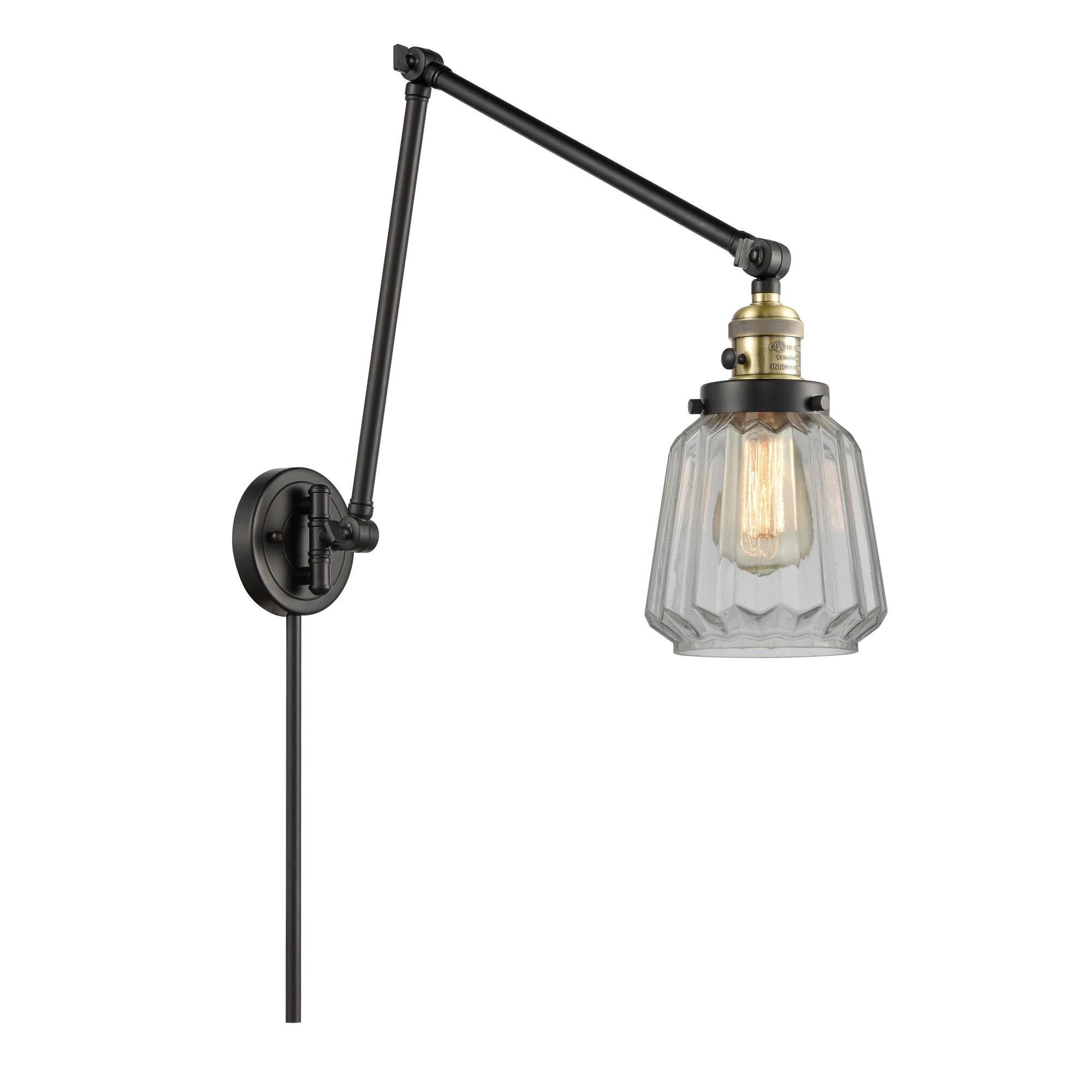 Shown in Black Antique Brass finish and Novelty glass and Glass shade