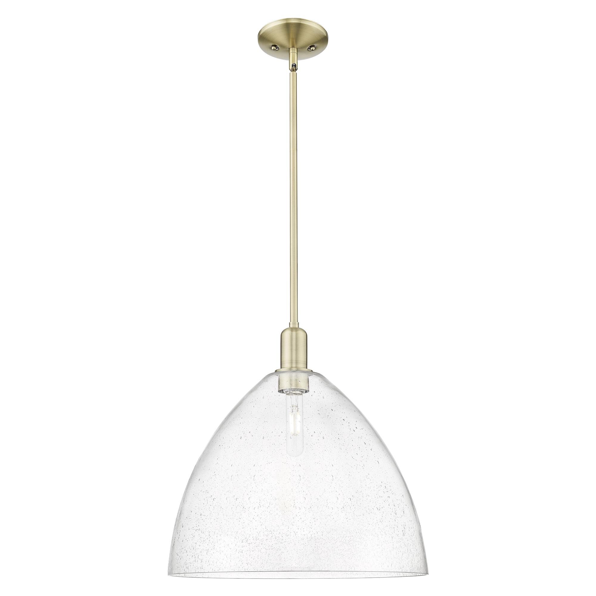 Shown in Antique Brass finish and Seedy glass