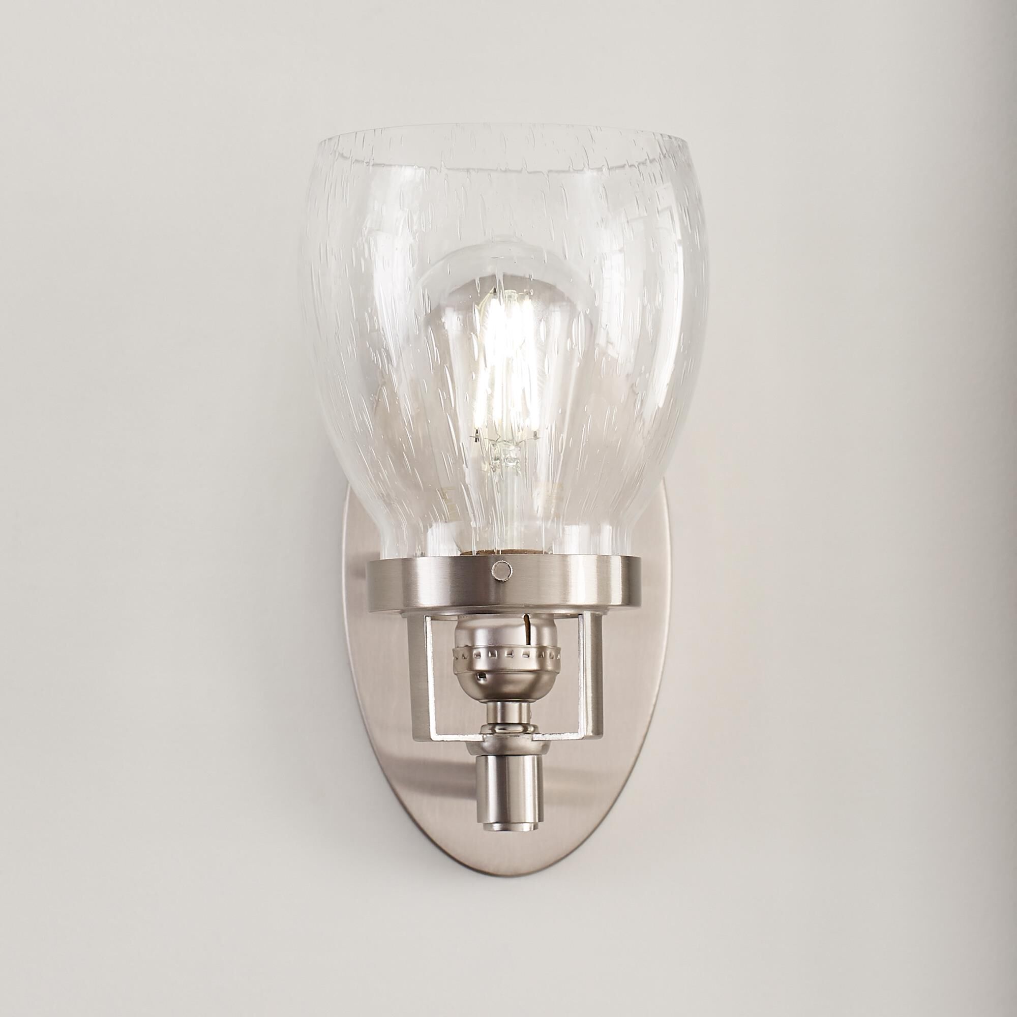 Shown in Brushed Nickel finish and Clear Seeded  Shade glass and Clear Seeded Glass shade