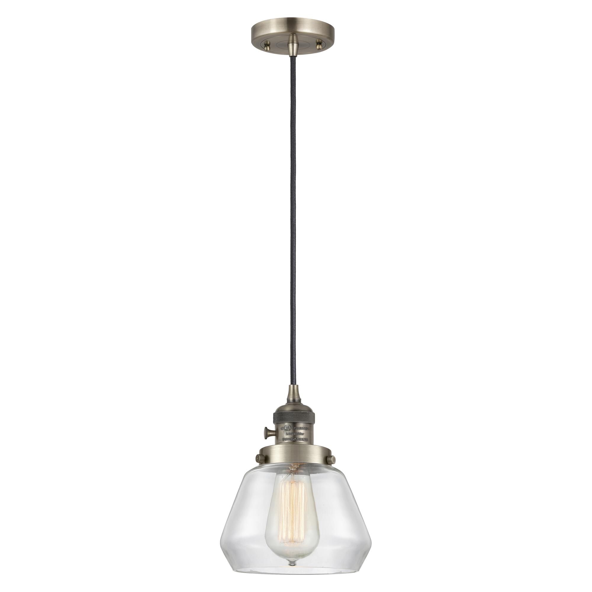 Shown in Antique Brass finish and Clear glass