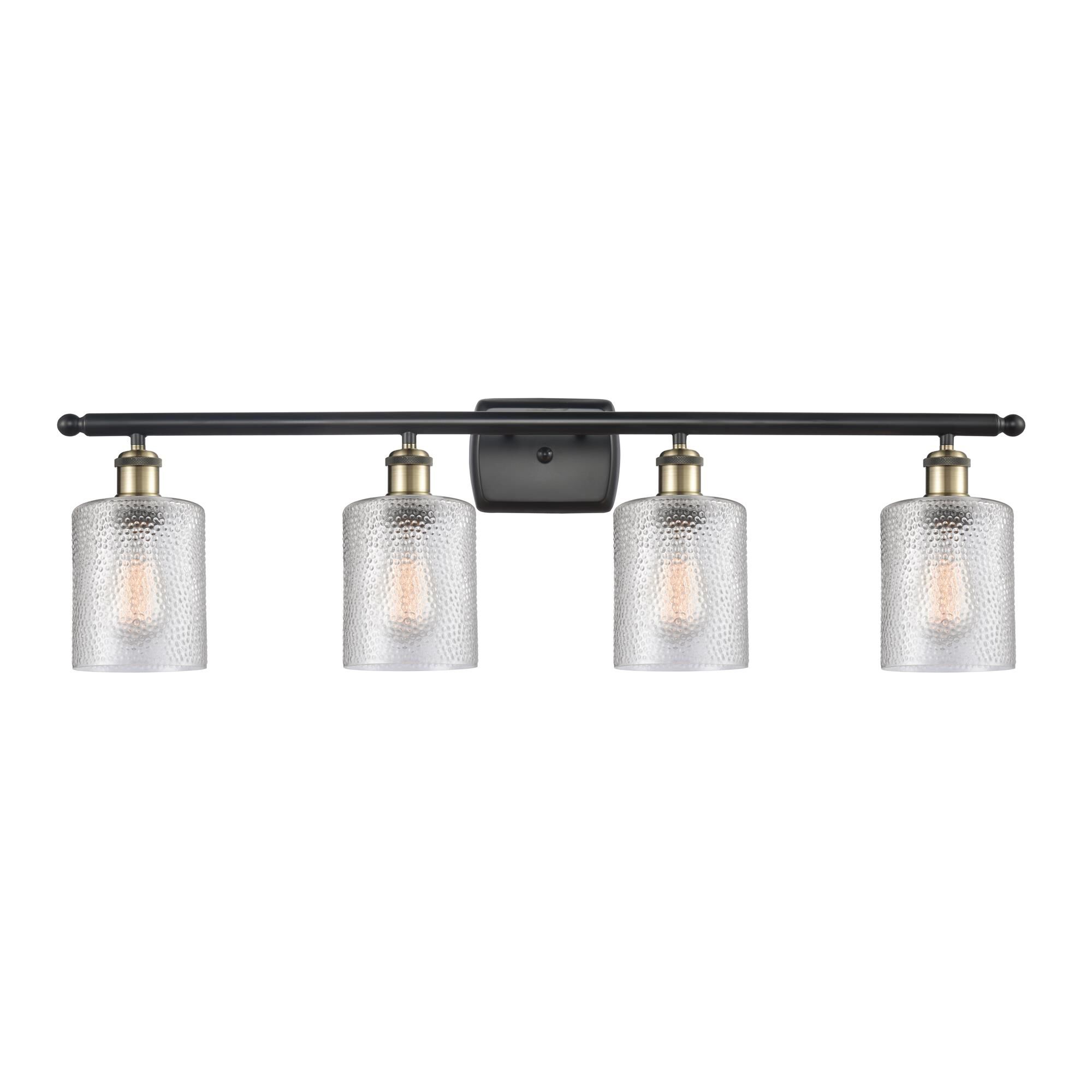 Shown in Black Antique Brass finish and Drum glass and Glass shade