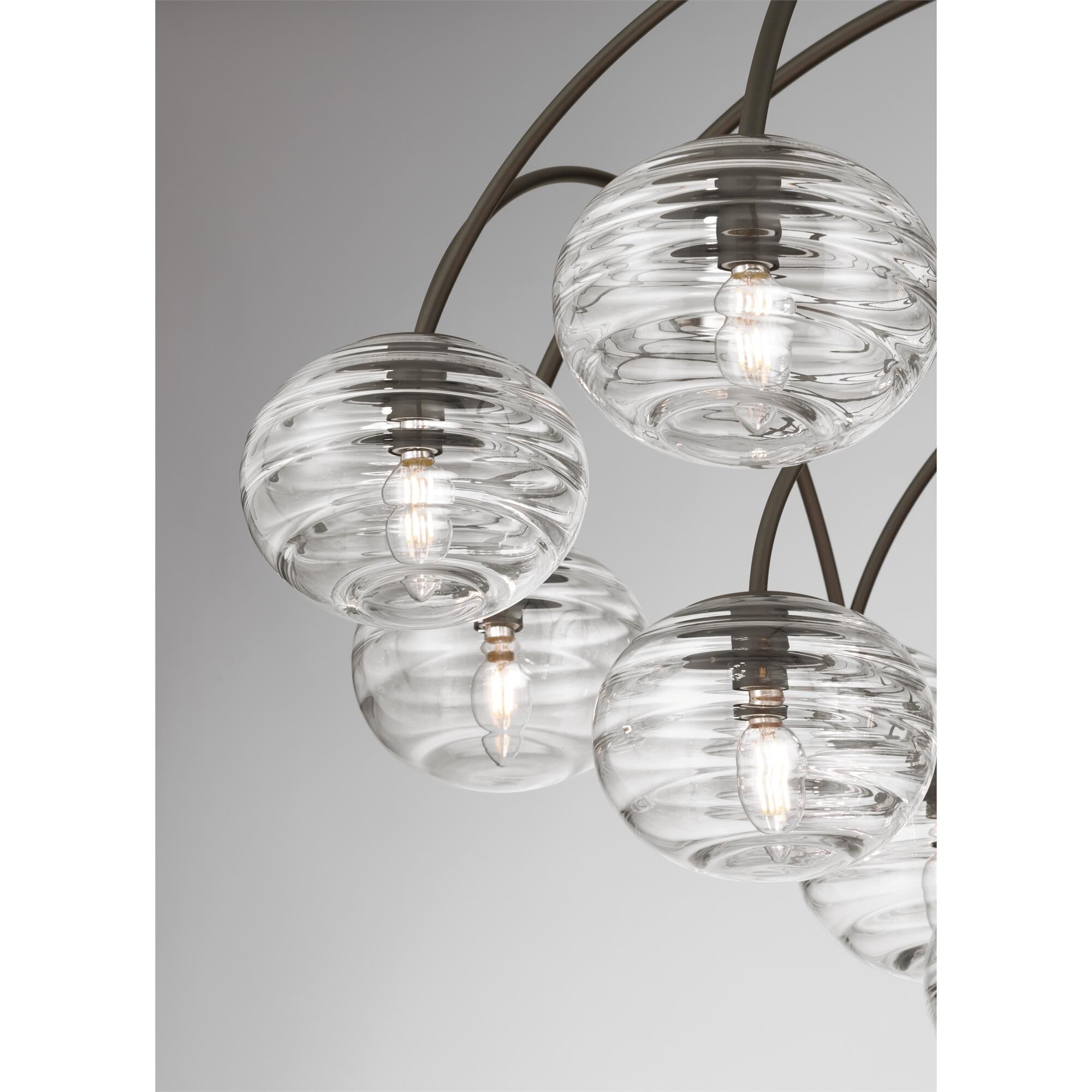 Shown in Dark Bronze finish and Clear Ribbed glass