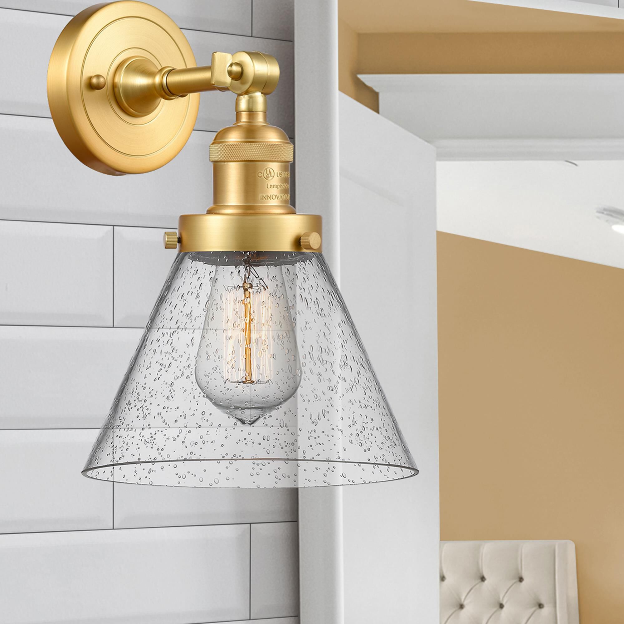 Shown in Satin Gold finish and Seedy Large Cone glass