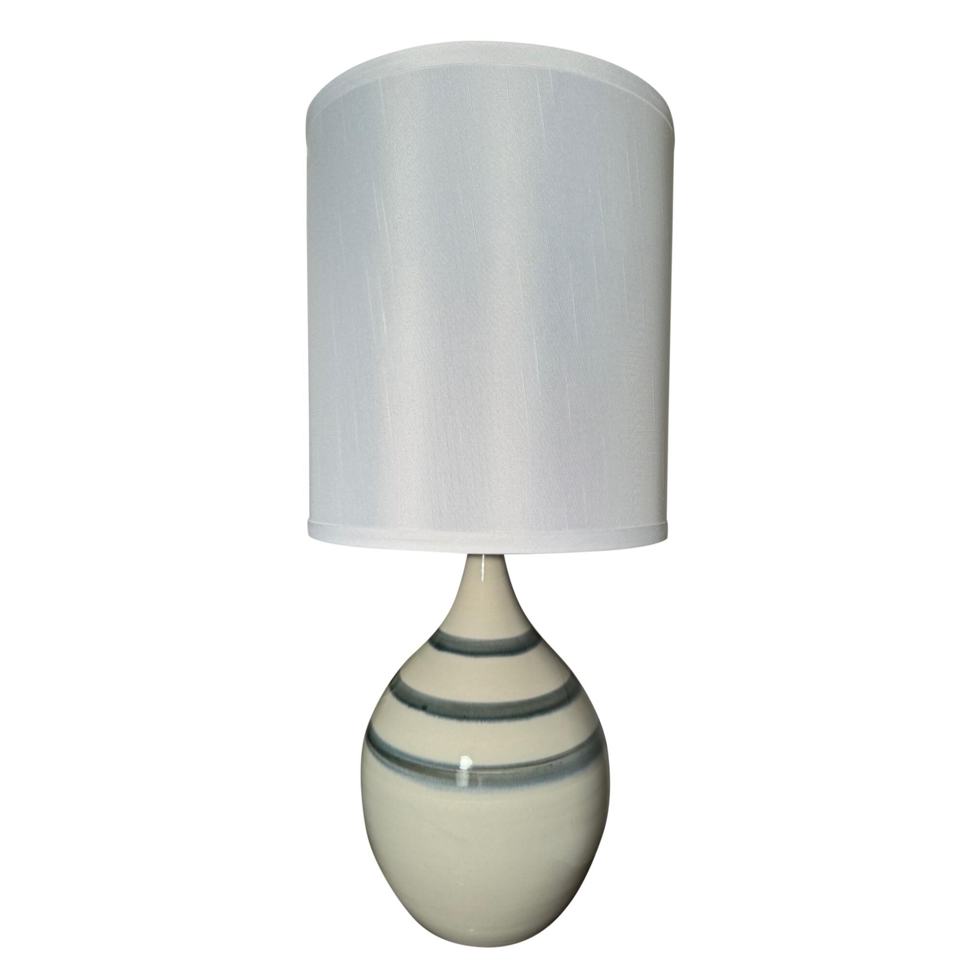 Shown in Trinity finish and White Linen Hardback shade