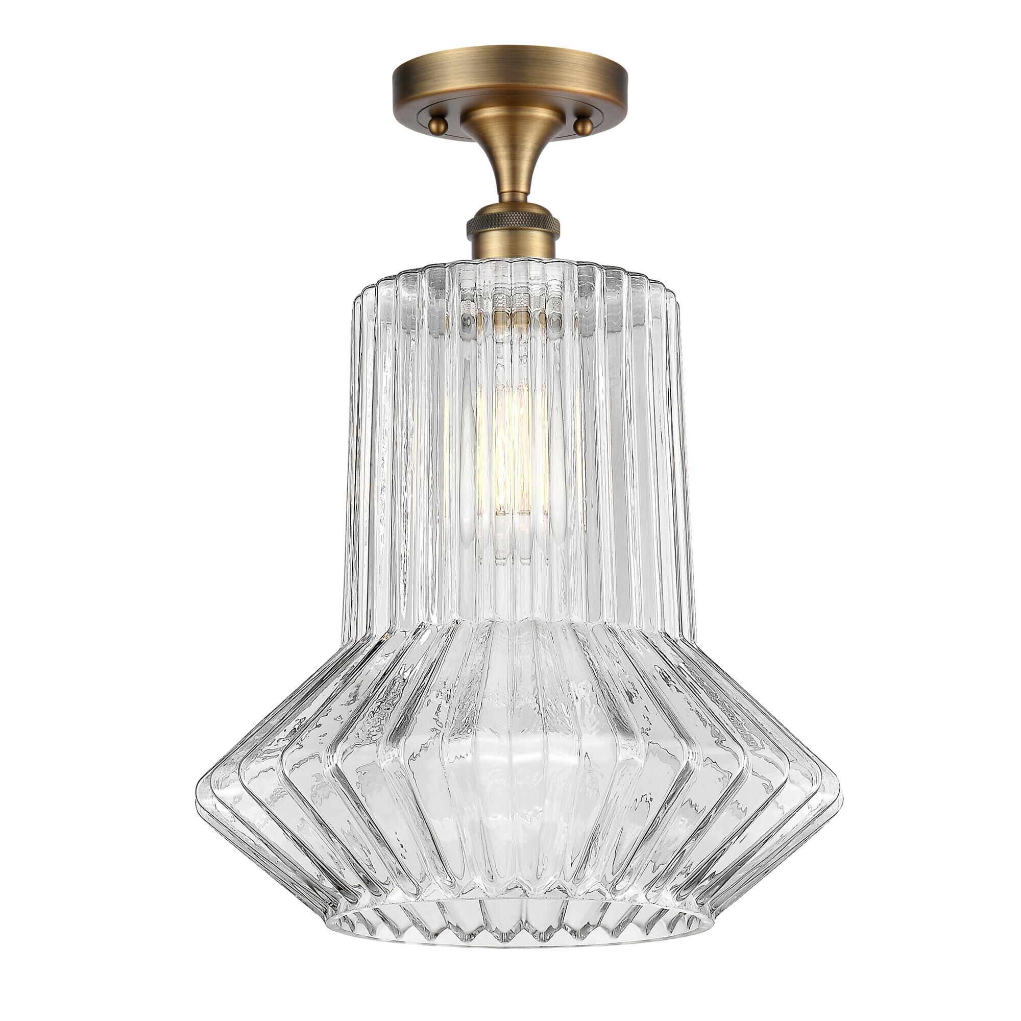 Shown in Brushed Brass finish and Novelty glass and Glass shade