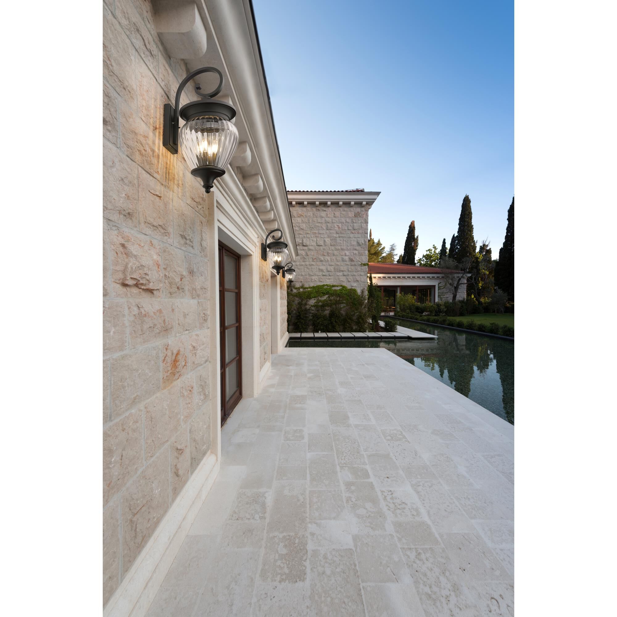 Shown in Black finish and Clear Ribbed glass and Clear Ribbed shade