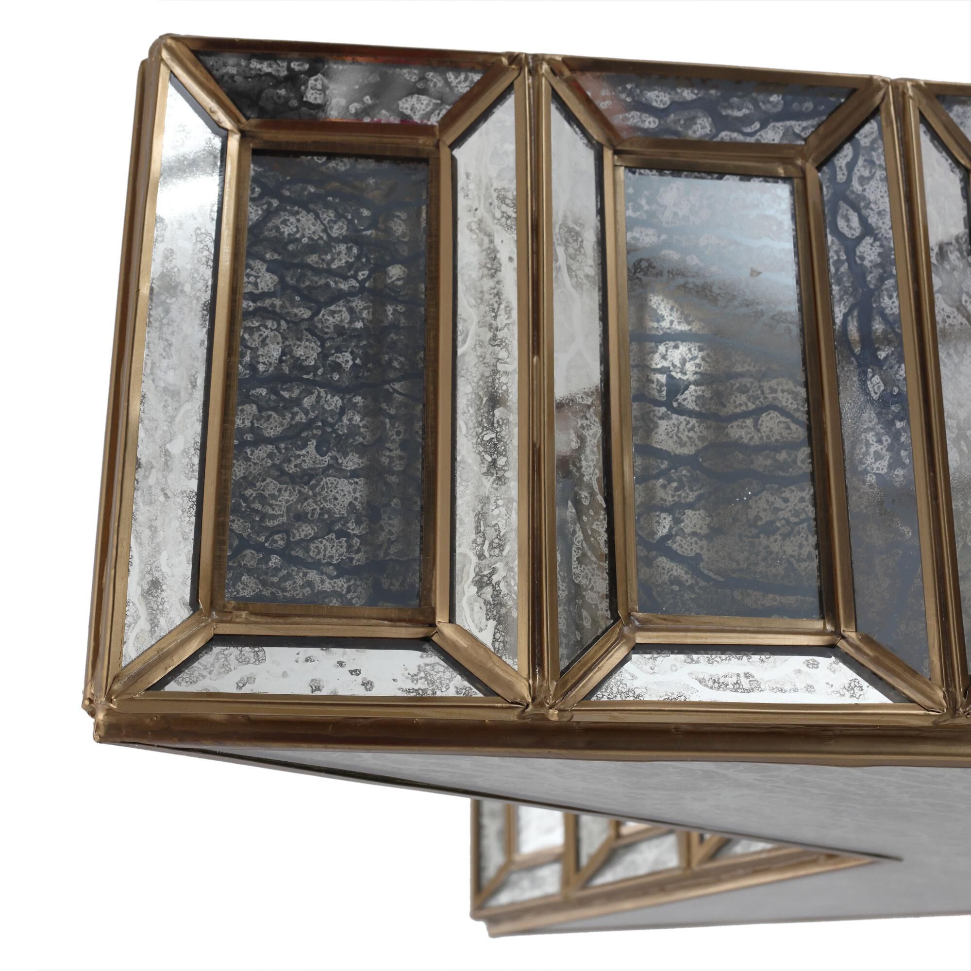 Shown in Brass Antique finish and Silver Antique glass