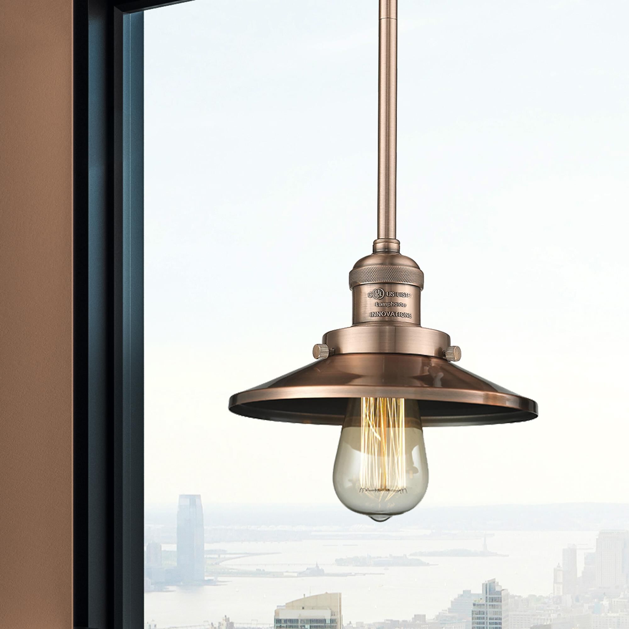 Shown in Antique Copper finish and Antique Copper shade