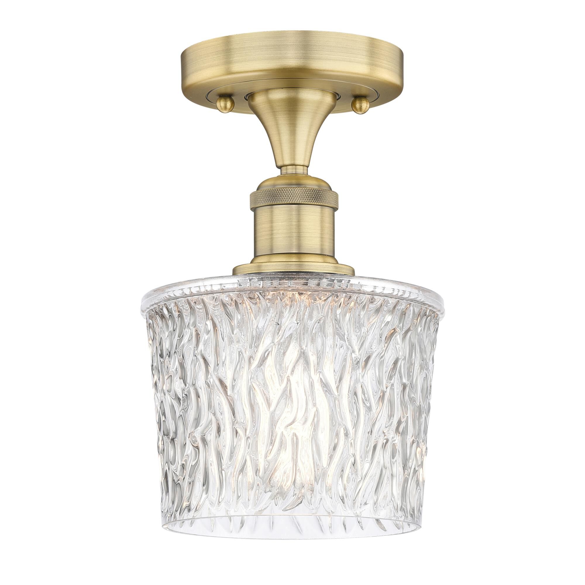 Shown in Brushed Brass finish and Clear glass