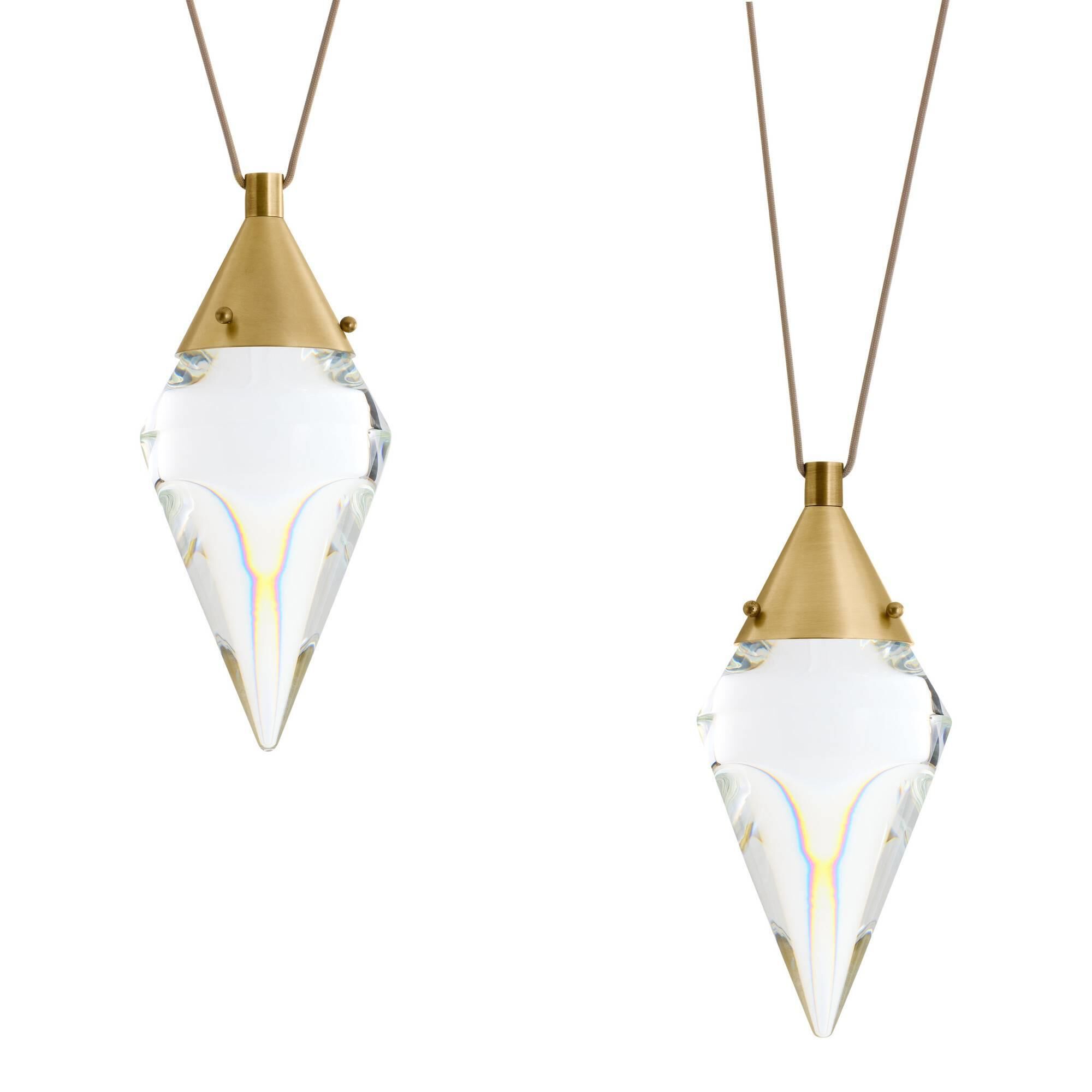 Shown in Antique Brass finish and Clear glass