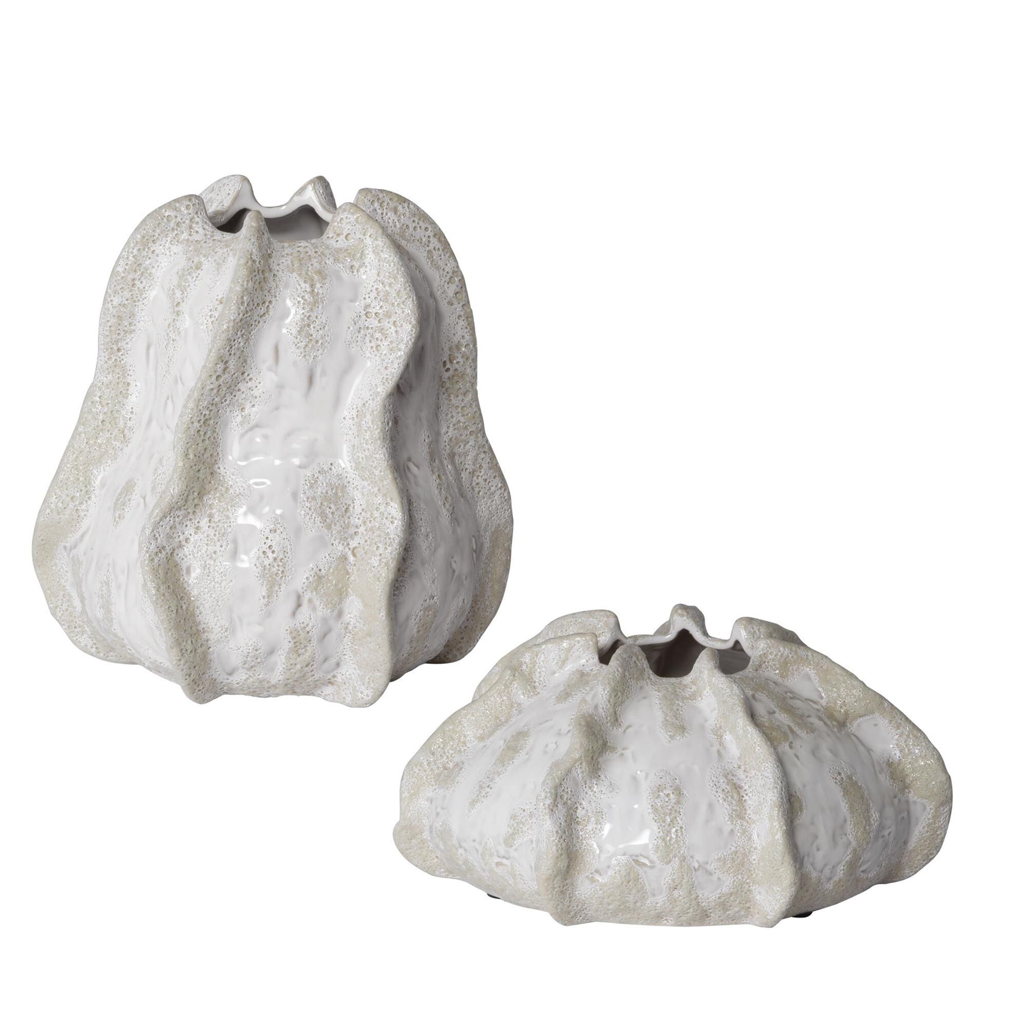 Shown in Taking Cues From Coastal Style, These Ceramic Vases Are Finished In An Ivory And Beige Glaze With No finish