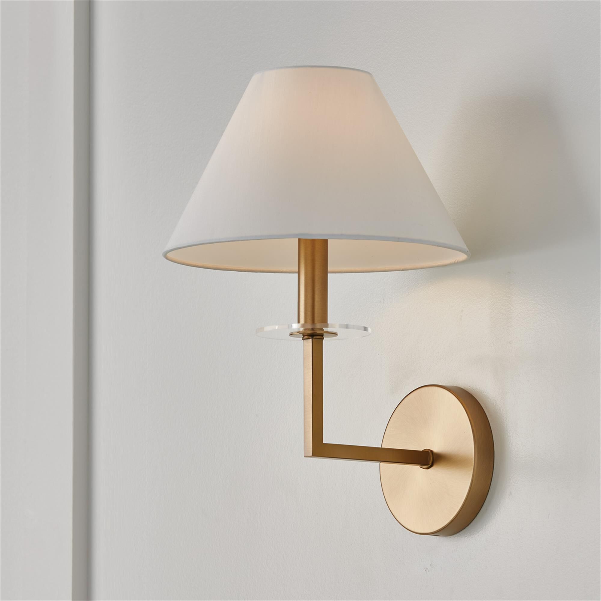 Shown in Aged Brass finish and White Fabric Stay-Straight shade