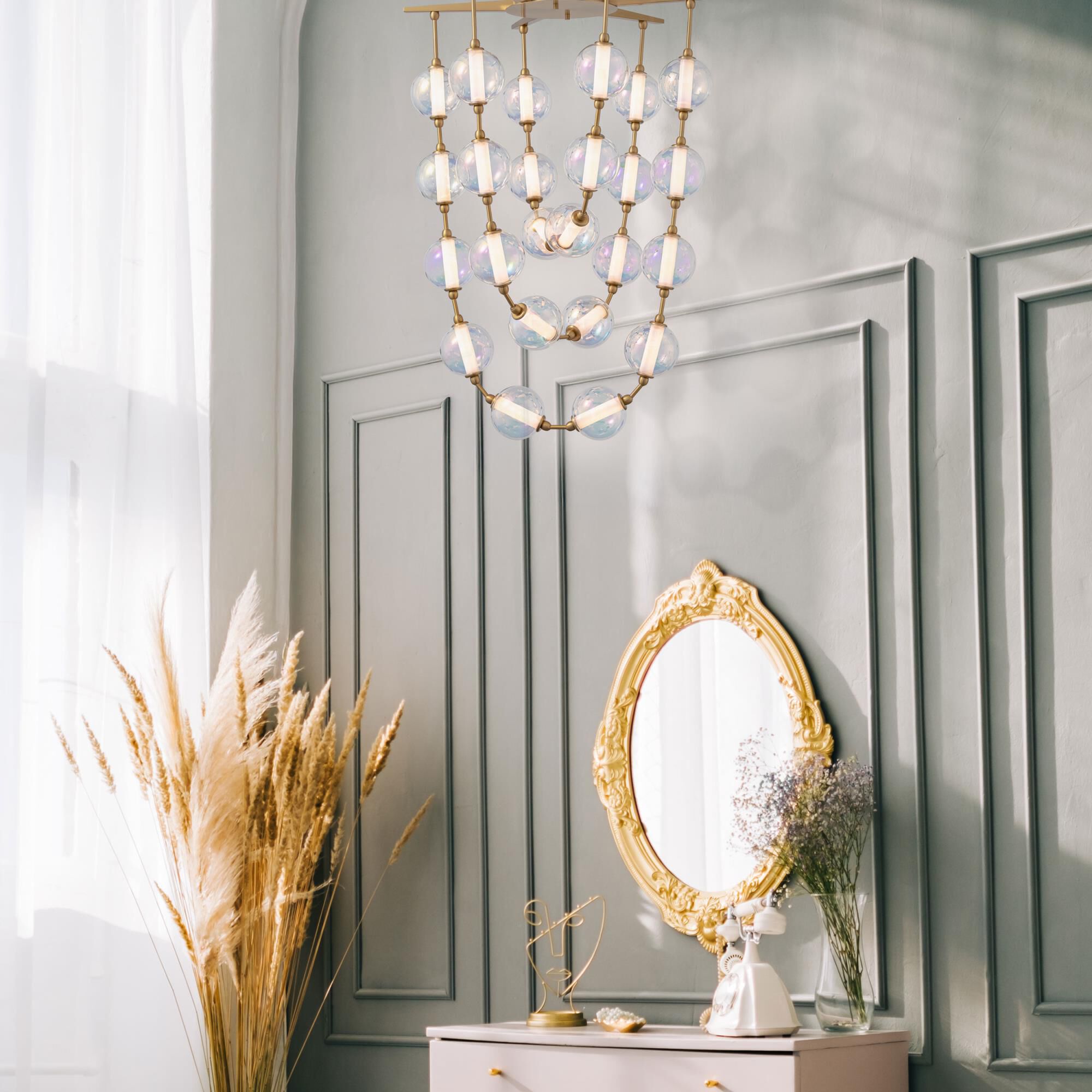 Shown in Brushed Champagne Bronze finish and Iridescent glass