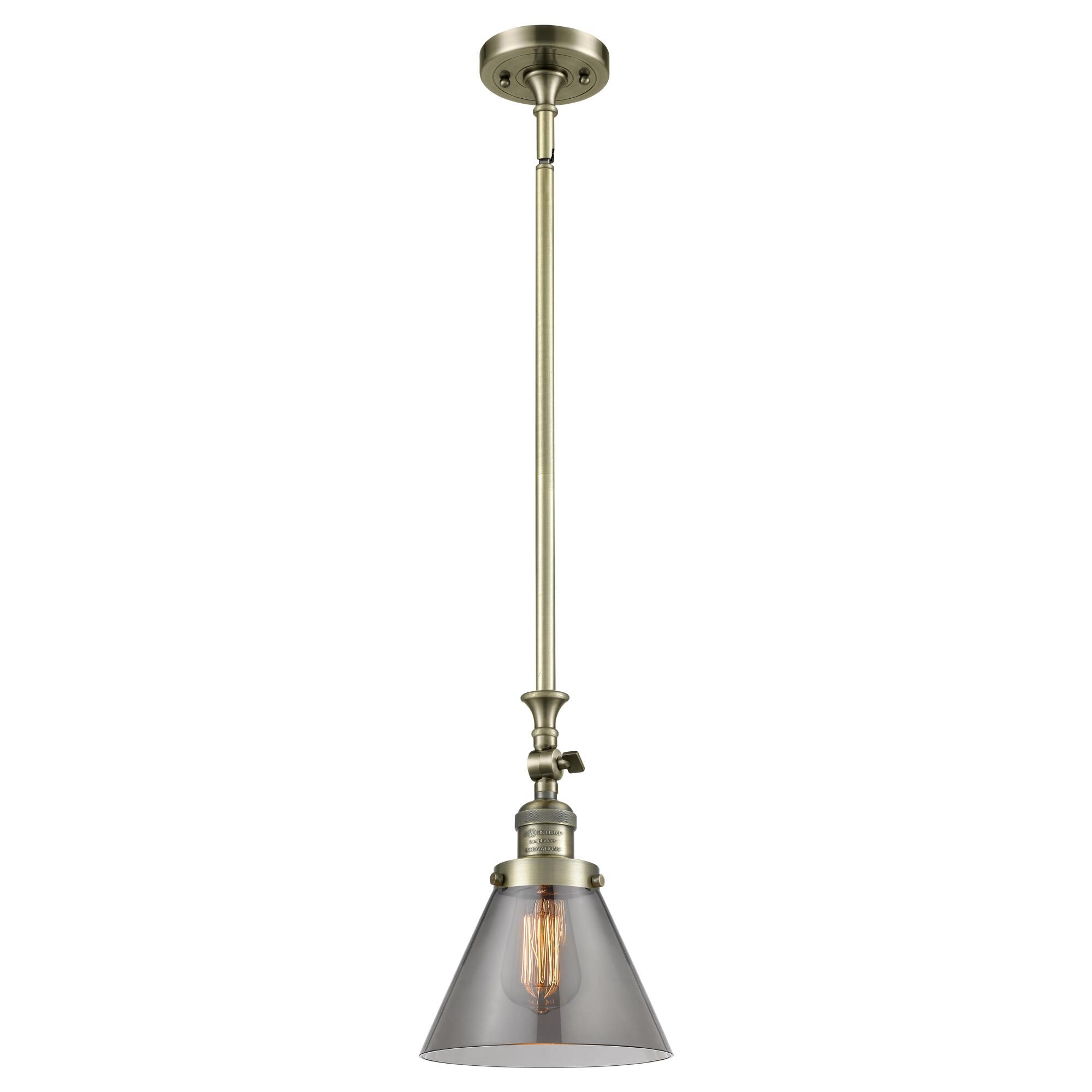 Shown in Antique Brass finish and Smoked glass