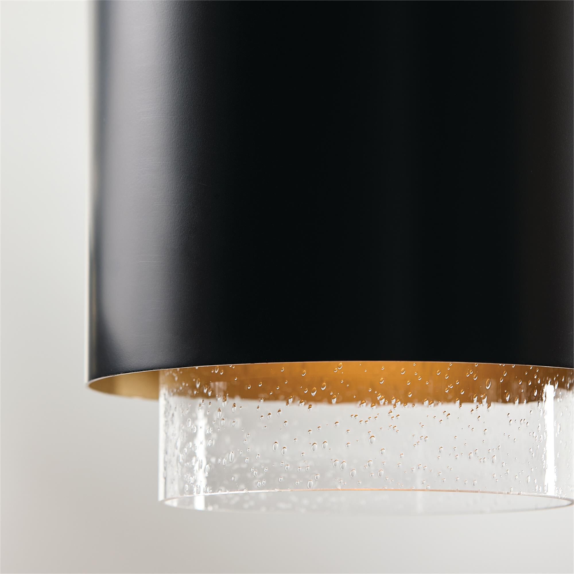 Shown in Matte Brass and Black finish and Clear Seeded glass and Metal with Brass Interior shade