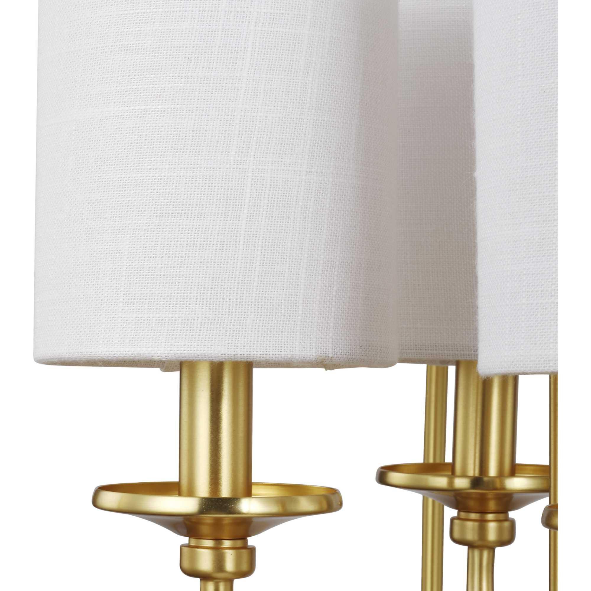 Shown in Satin Brass finish and White Linen glass
