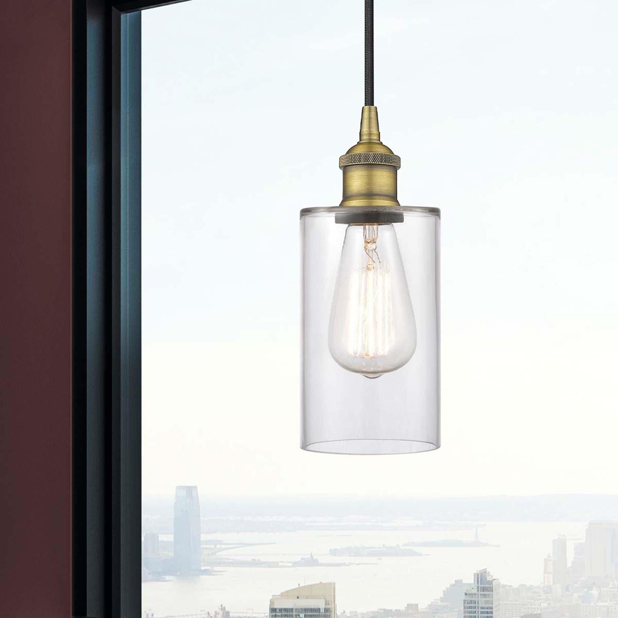 Shown in Brushed Brass finish and Clear glass