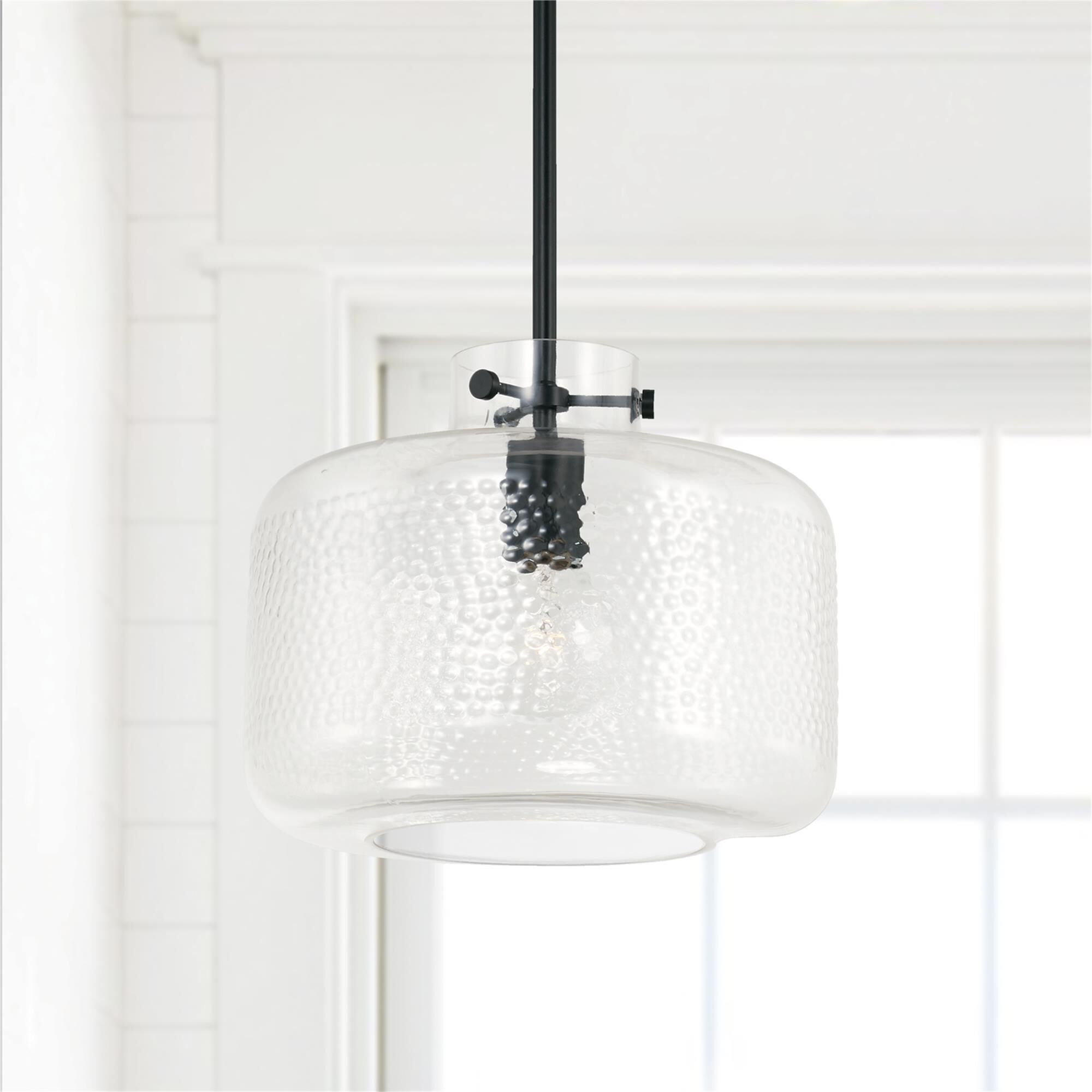 Shown in Matte Black finish and Clear Pebbled glass