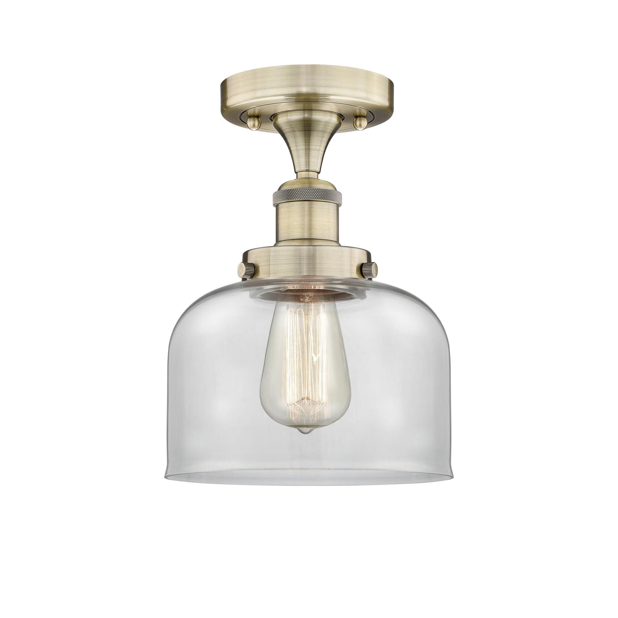 Shown in Antique Brass finish and Clear glass
