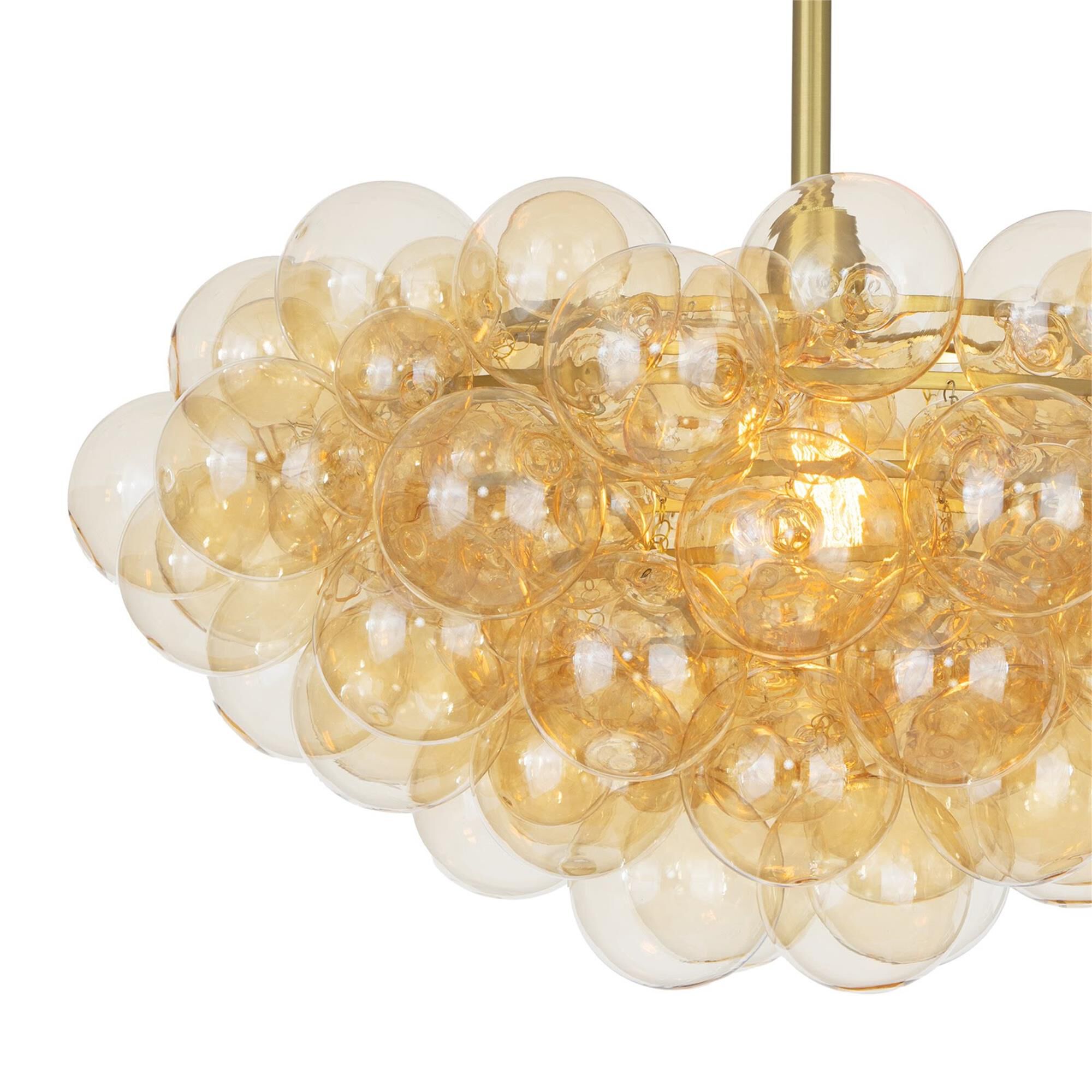 Shown in Natural Brass finish and Amber glass