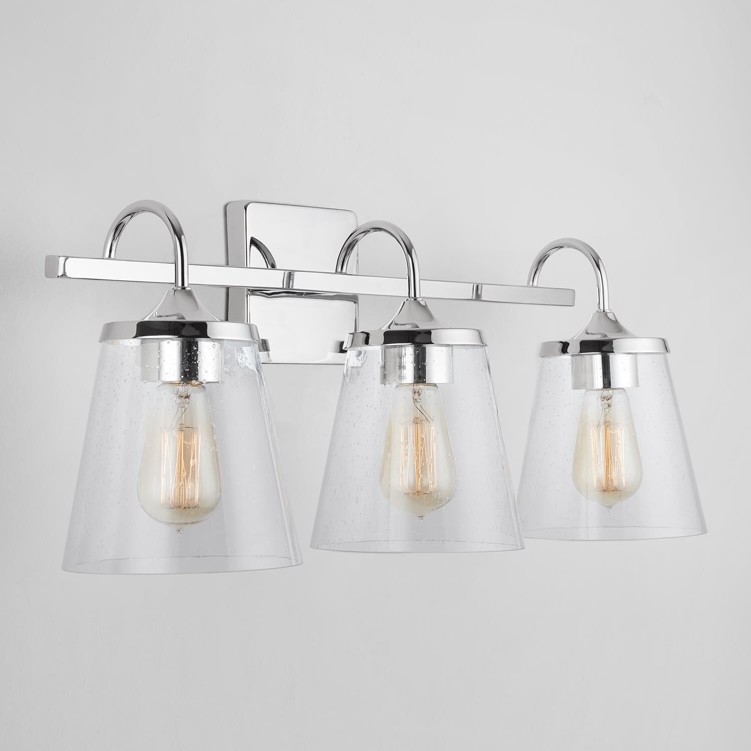 Shown in Chrome finish and Clear Seeded glass