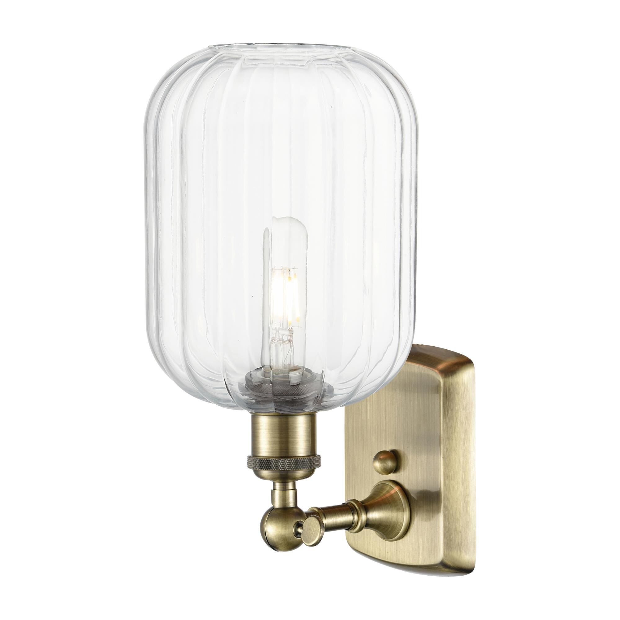 Shown in Antique Brass finish and Clear glass