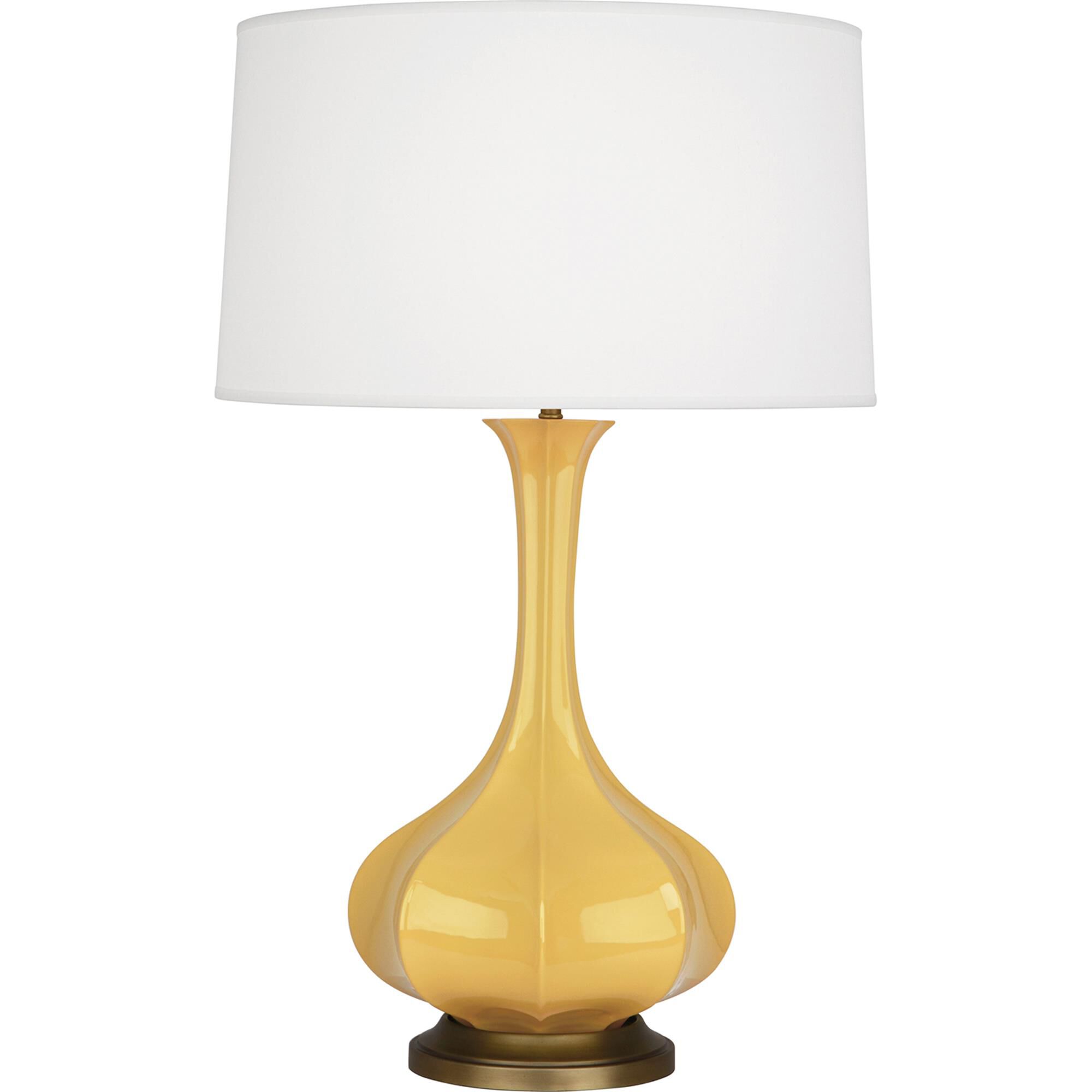 Shown in Sunset Yellow Glazed Ceramic With Aged Brass Accents finish and Pearl Dupoini Fabric shade