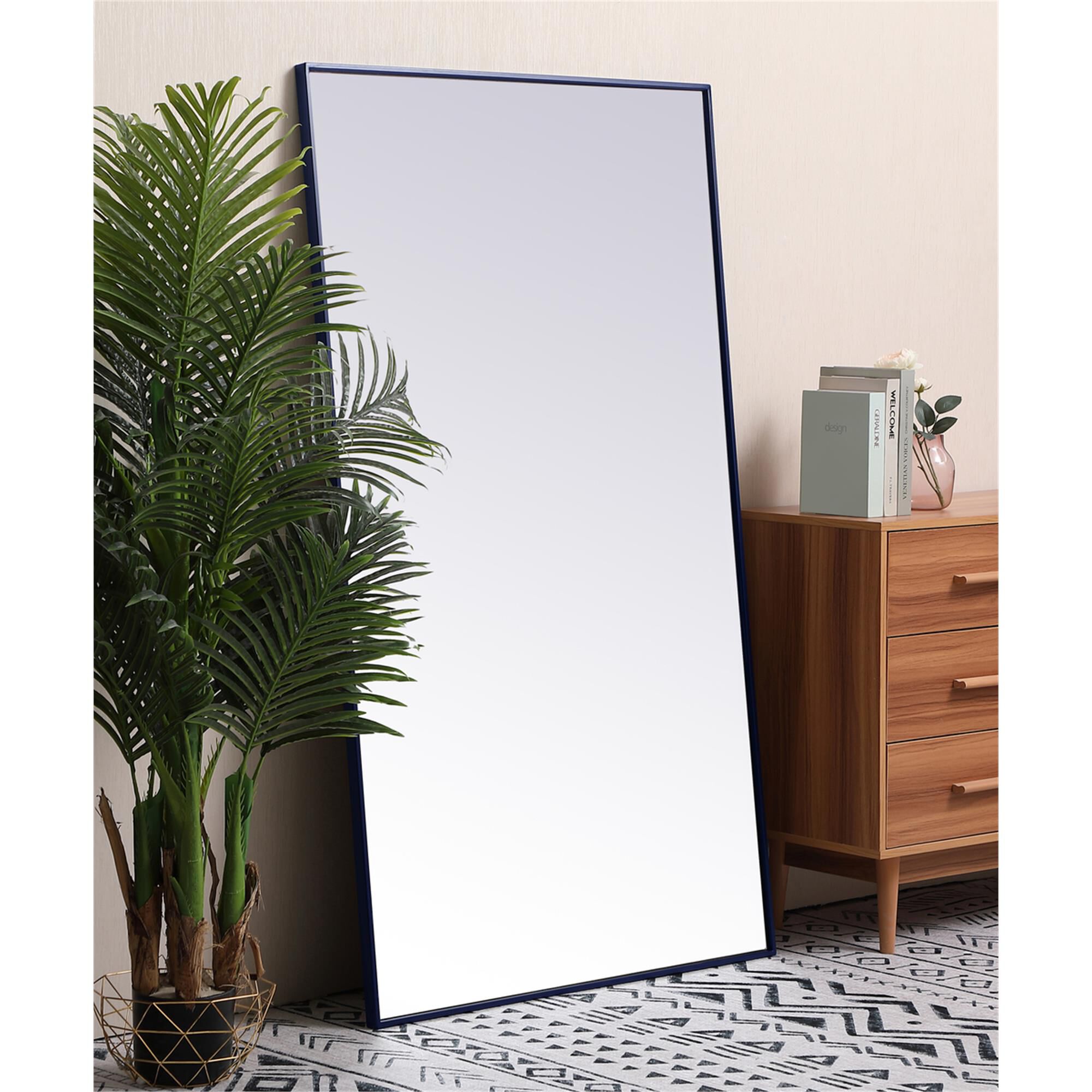 Shown in Brass finish and Clear Mirror Beveled glass