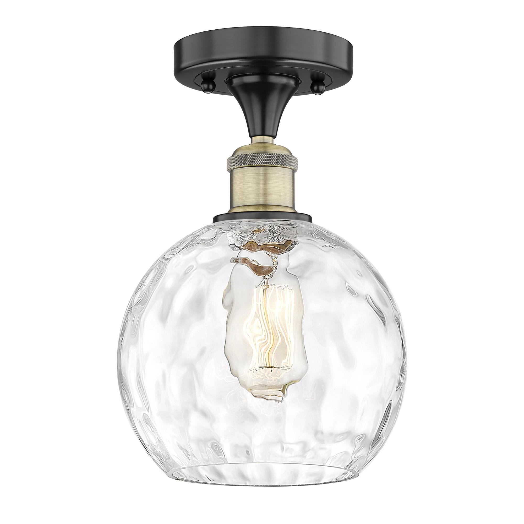 Shown in Black Antique Brass finish and Clear Water Glass glass