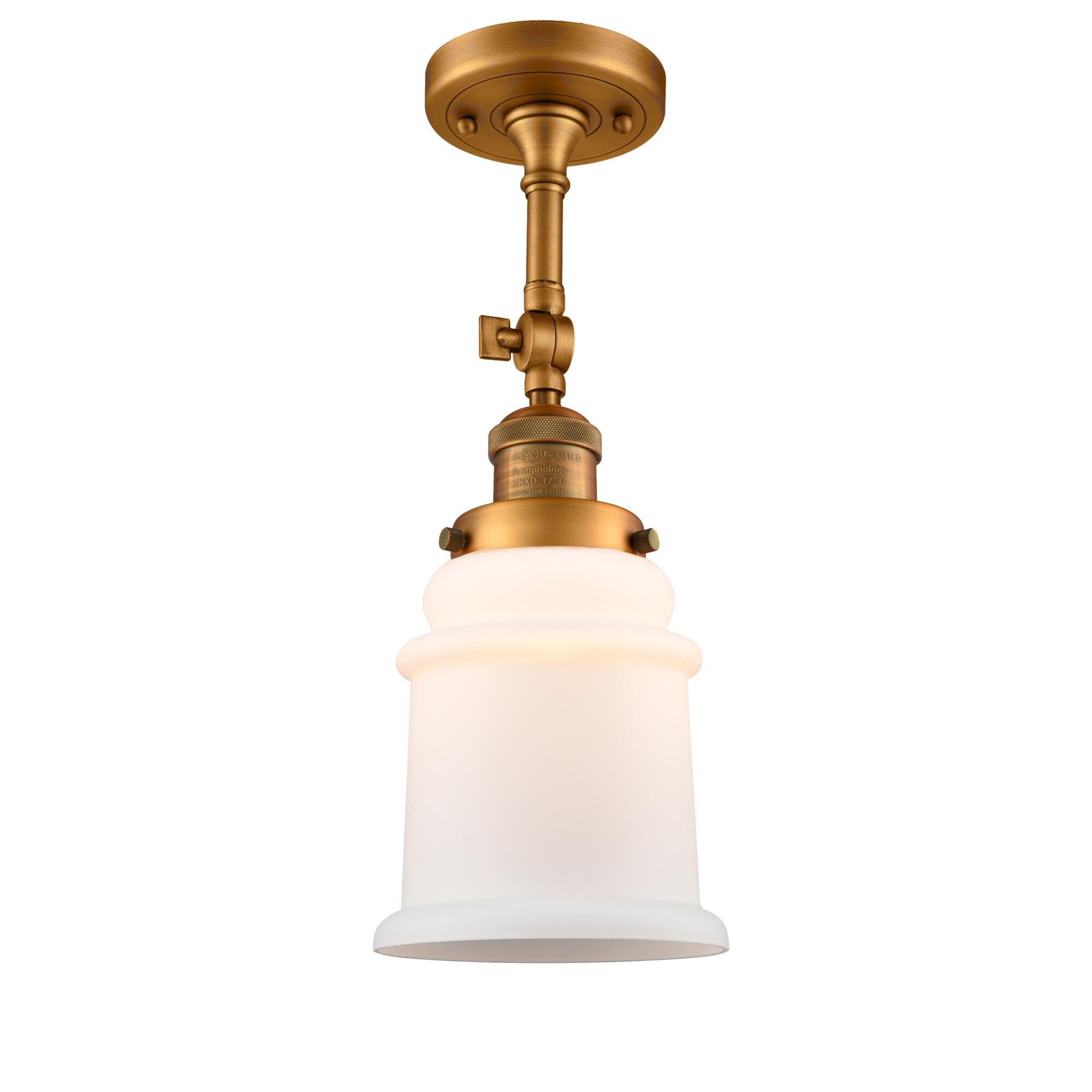 Shown in Brushed Brass finish and Frosted glass and None accent