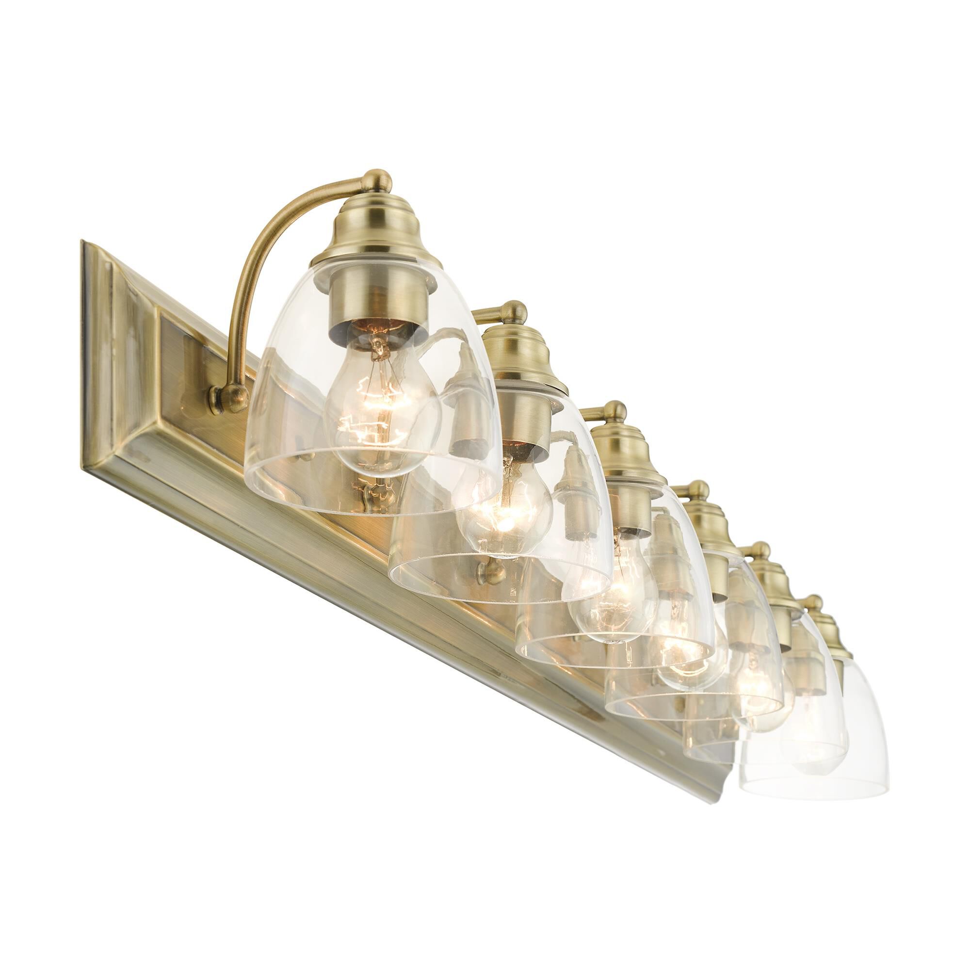 Shown in Antique Brass finish and Hand Blown Clear glass