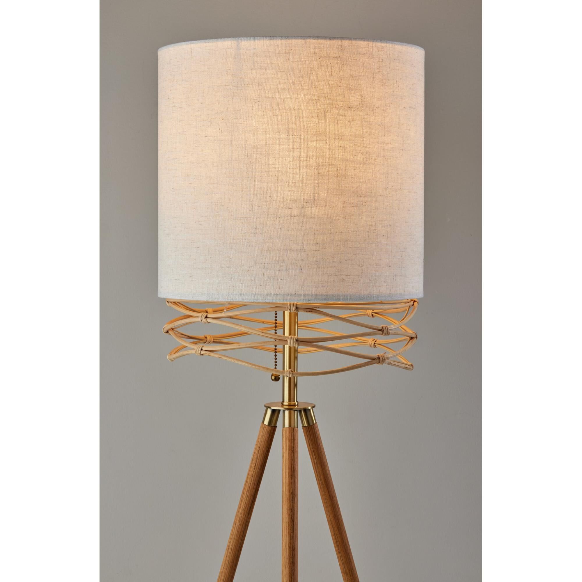 Shown in Natural Wood Veneer & Antique Brass Accents finish and White Textured Fabric shade