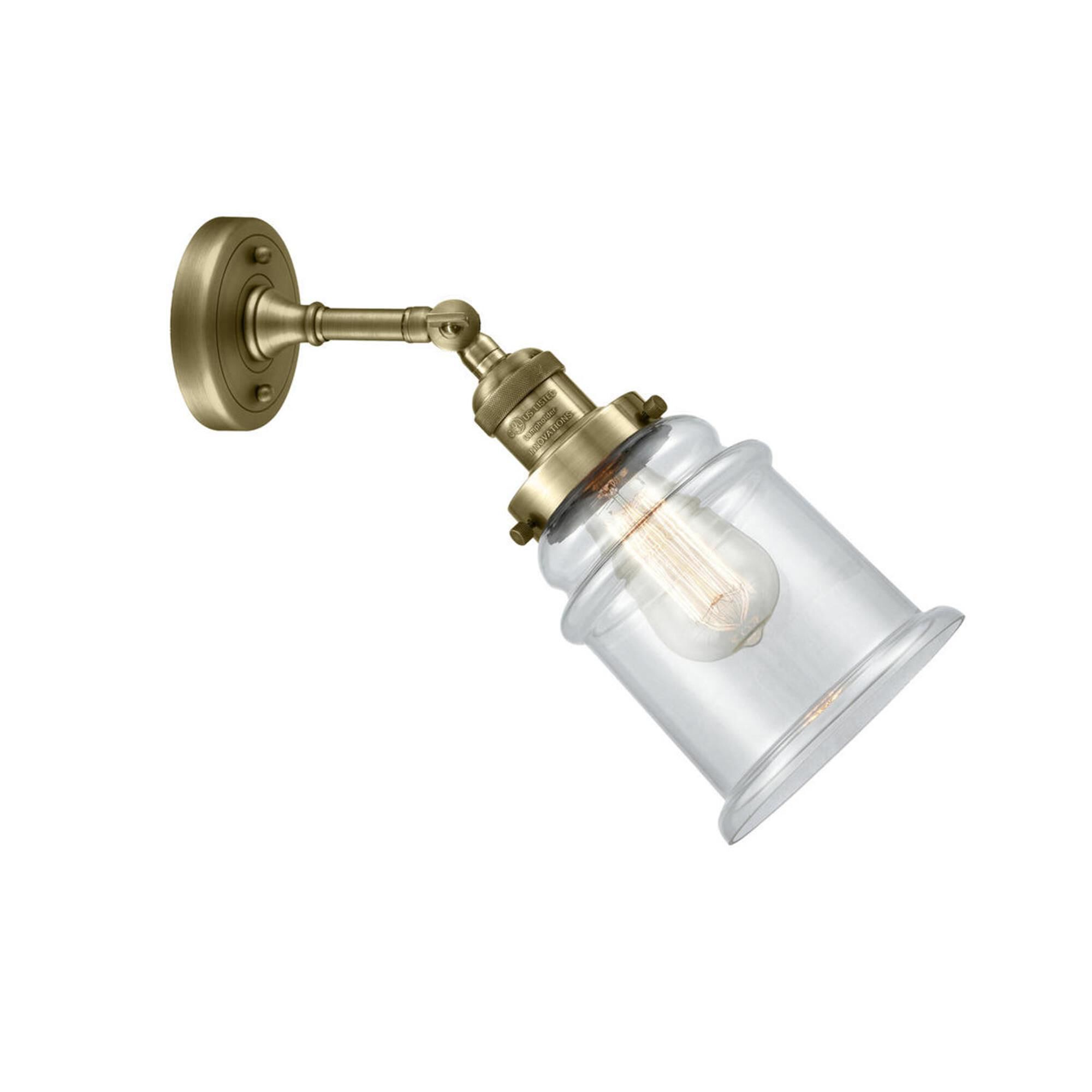 Shown in Antique Brass finish and Clear glass and None accent