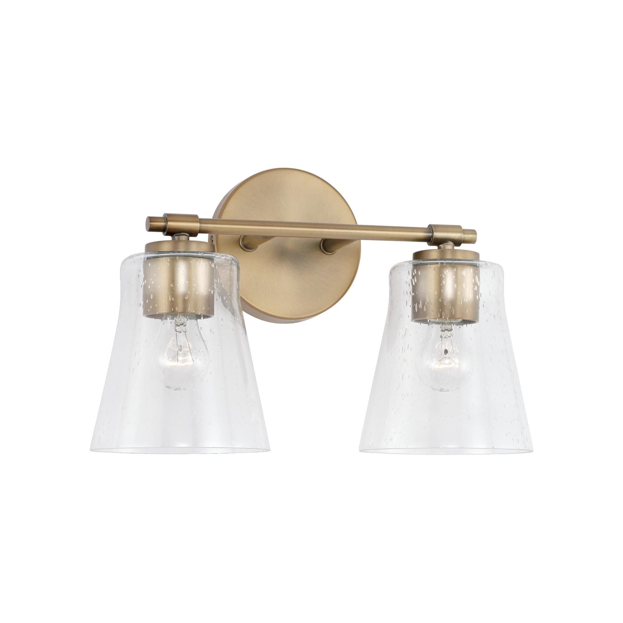 Shown in Aged Brass finish and Clear Seeded glass