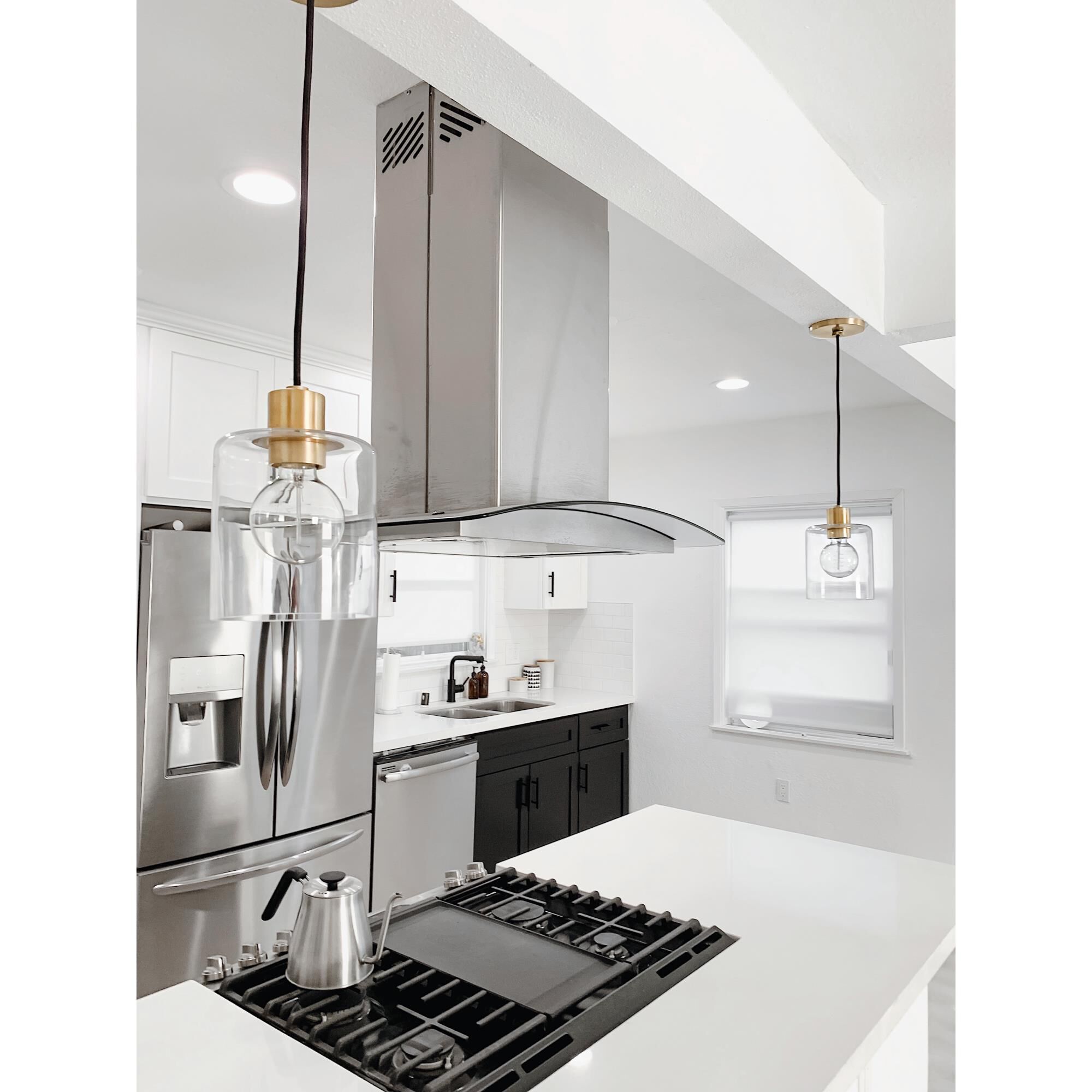 Shown in Aged Brass finish and Black accent