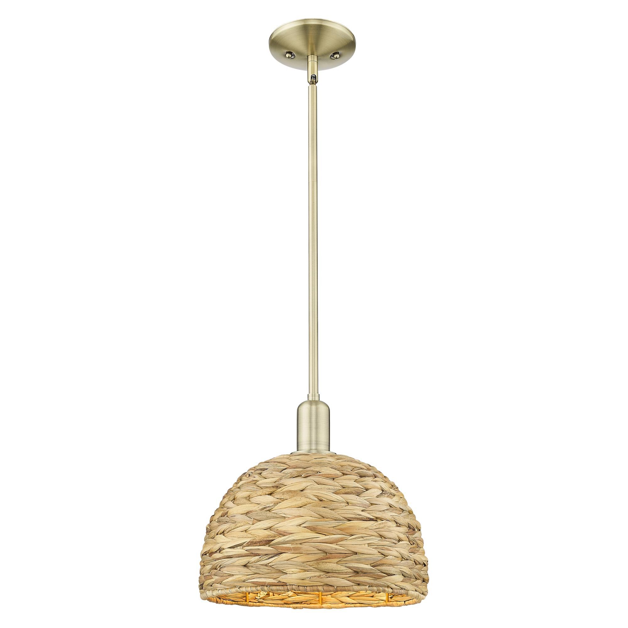 Shown in Antique Brass finish and Natural shade