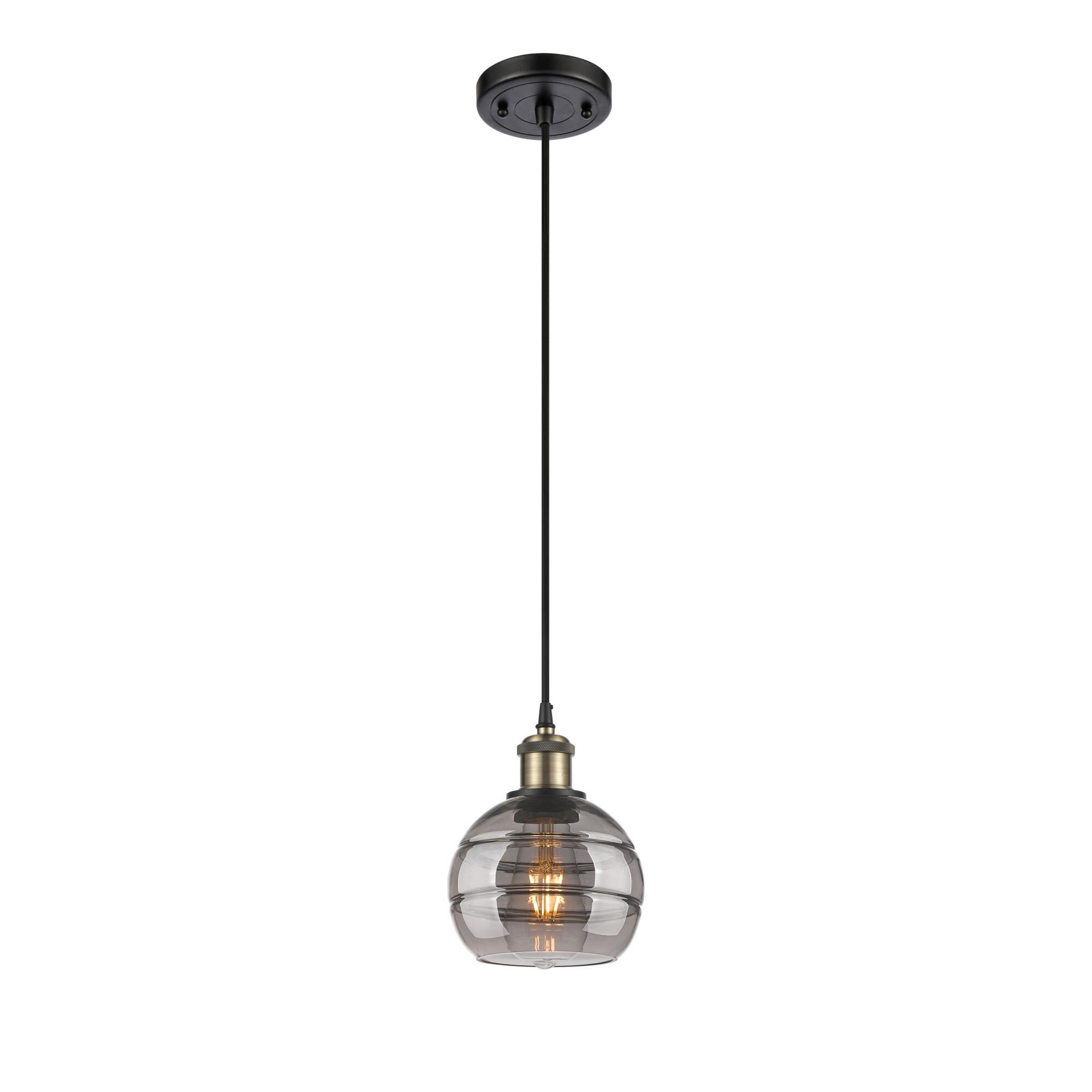 Shown in Black Antique Brass finish and Light Smoke glass