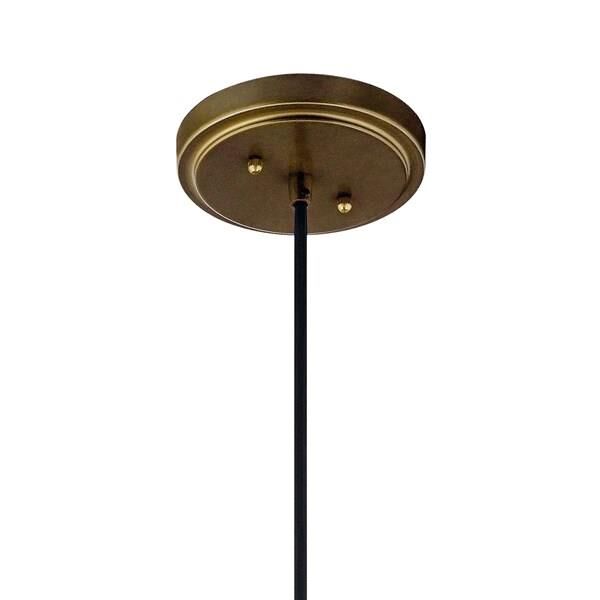 Shown in Natural Brass finish and Metal shade