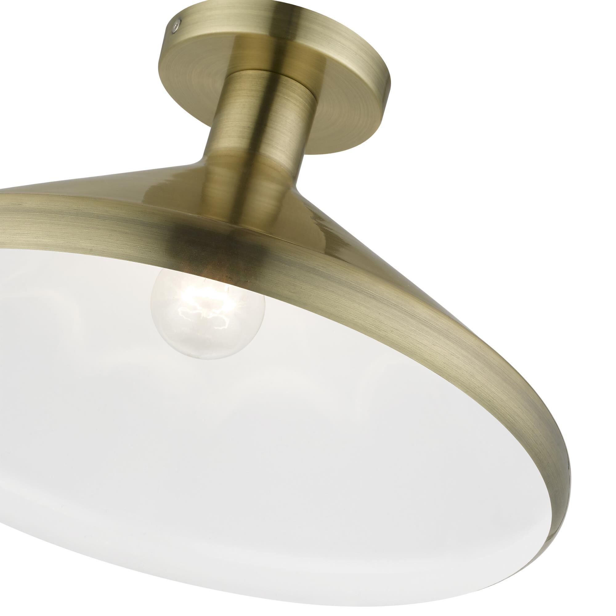 Shown in Antique Brass finish and Antique Brass Metal with Shiny White Inside shade